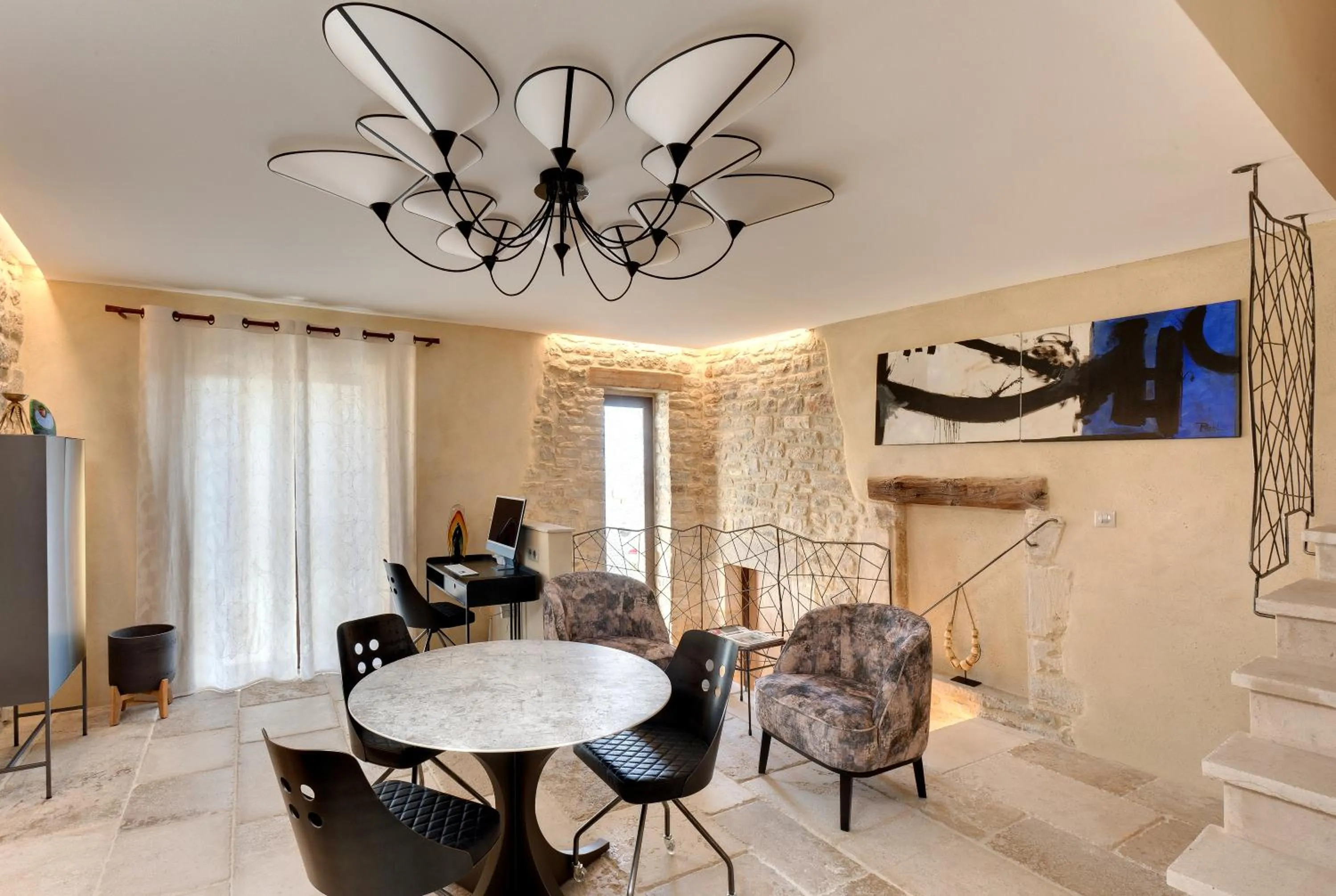 Living room in La Maison du Passage - Chambres - Suites premium, Spa, Piscine et Restaurant