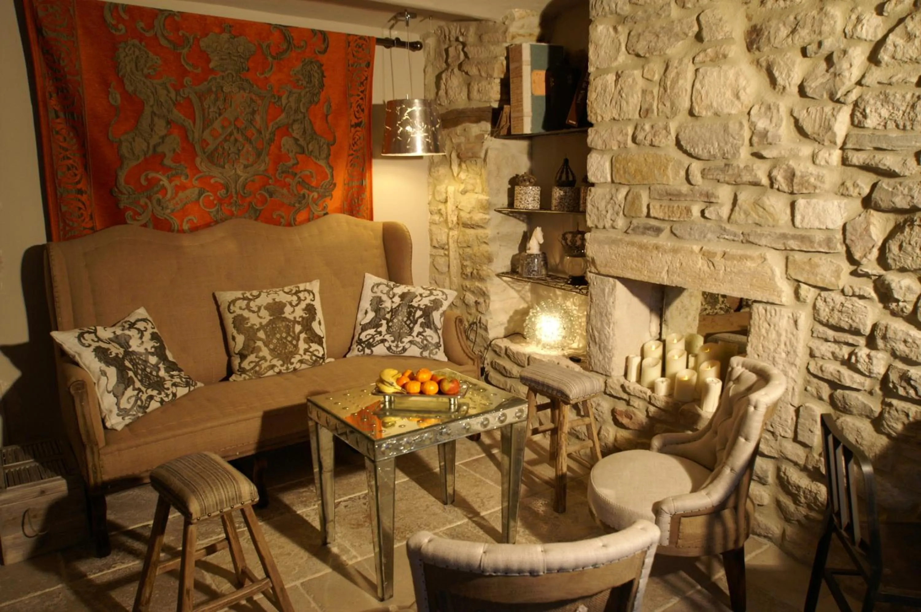 Living room in La Maison du Passage - Chambres - Suites premium, Spa, Piscine et Restaurant