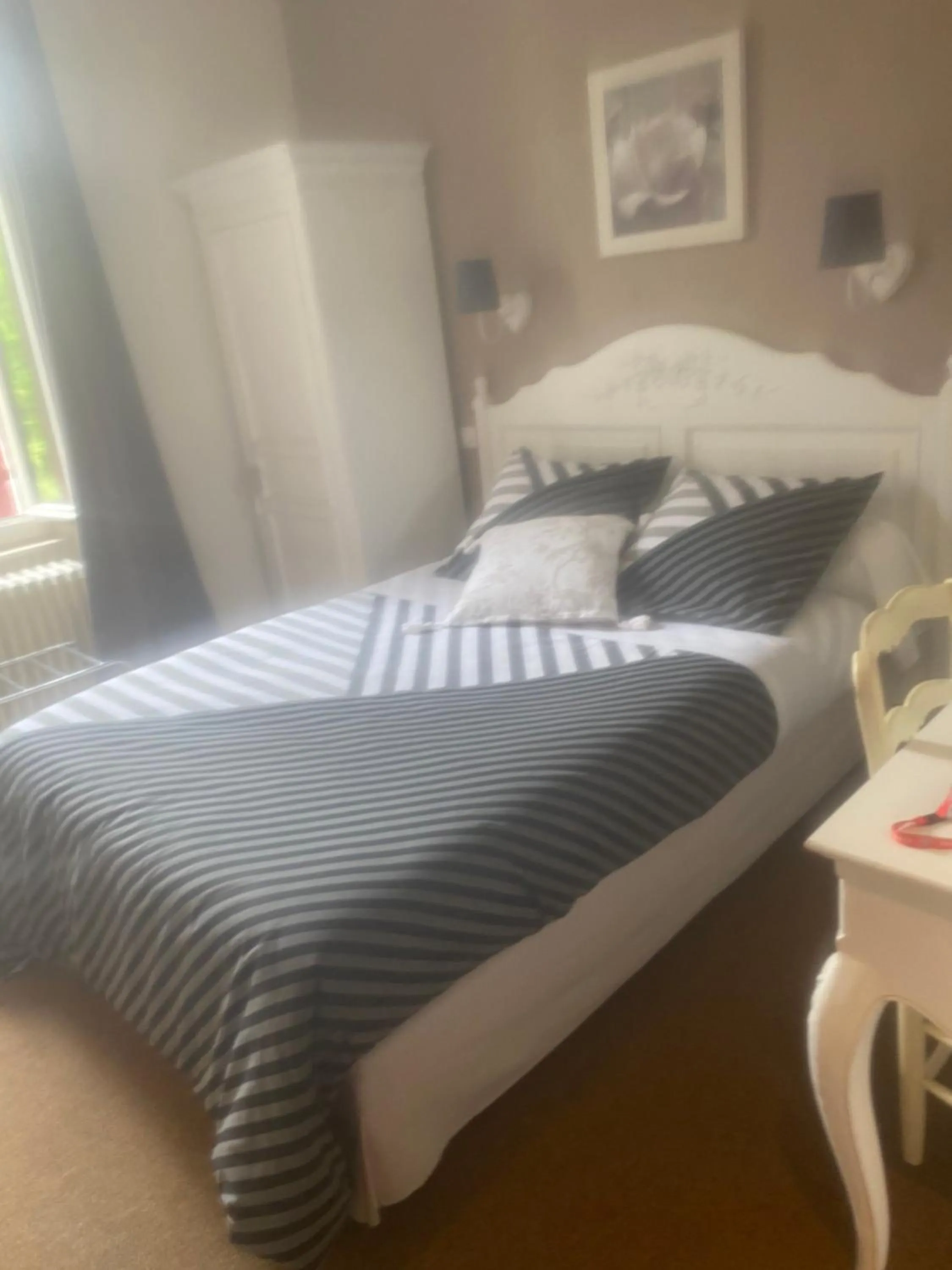 Bed in HOTEL LES MARRONNIERS