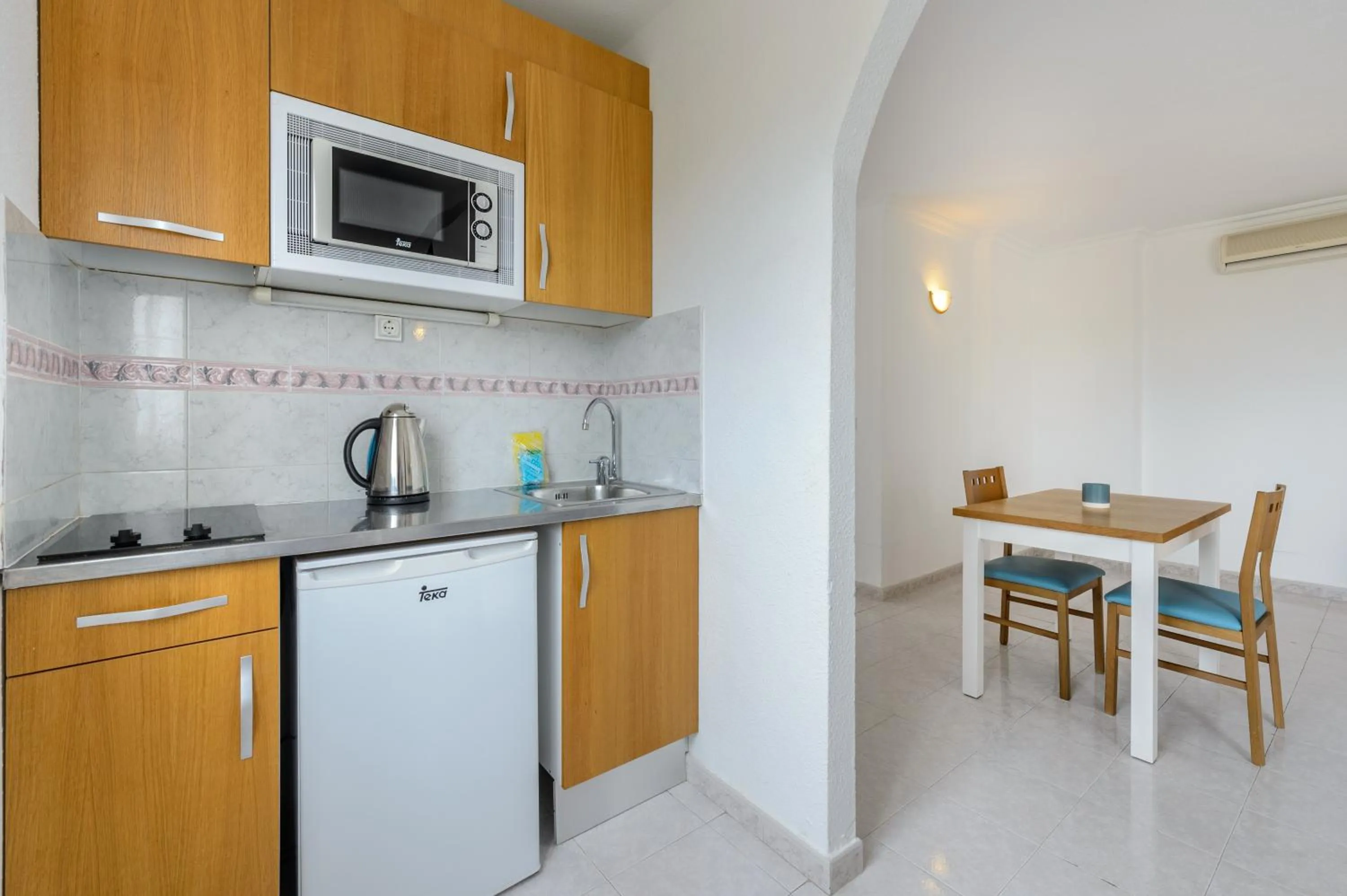 Kitchen or kitchenette in Hotel Apartamentos Vibra San Marino