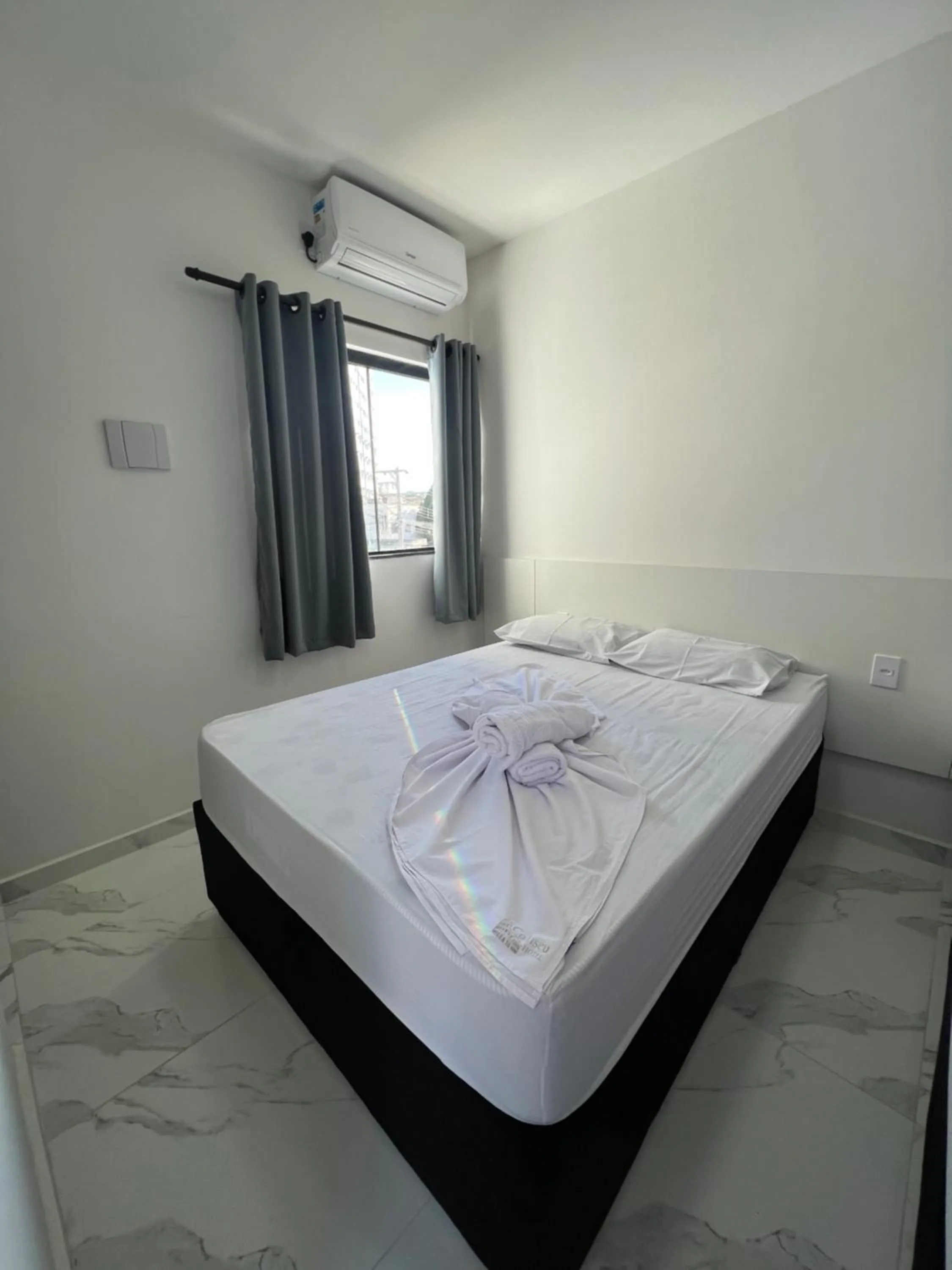 Bed in Hotel Pousada Colliseu