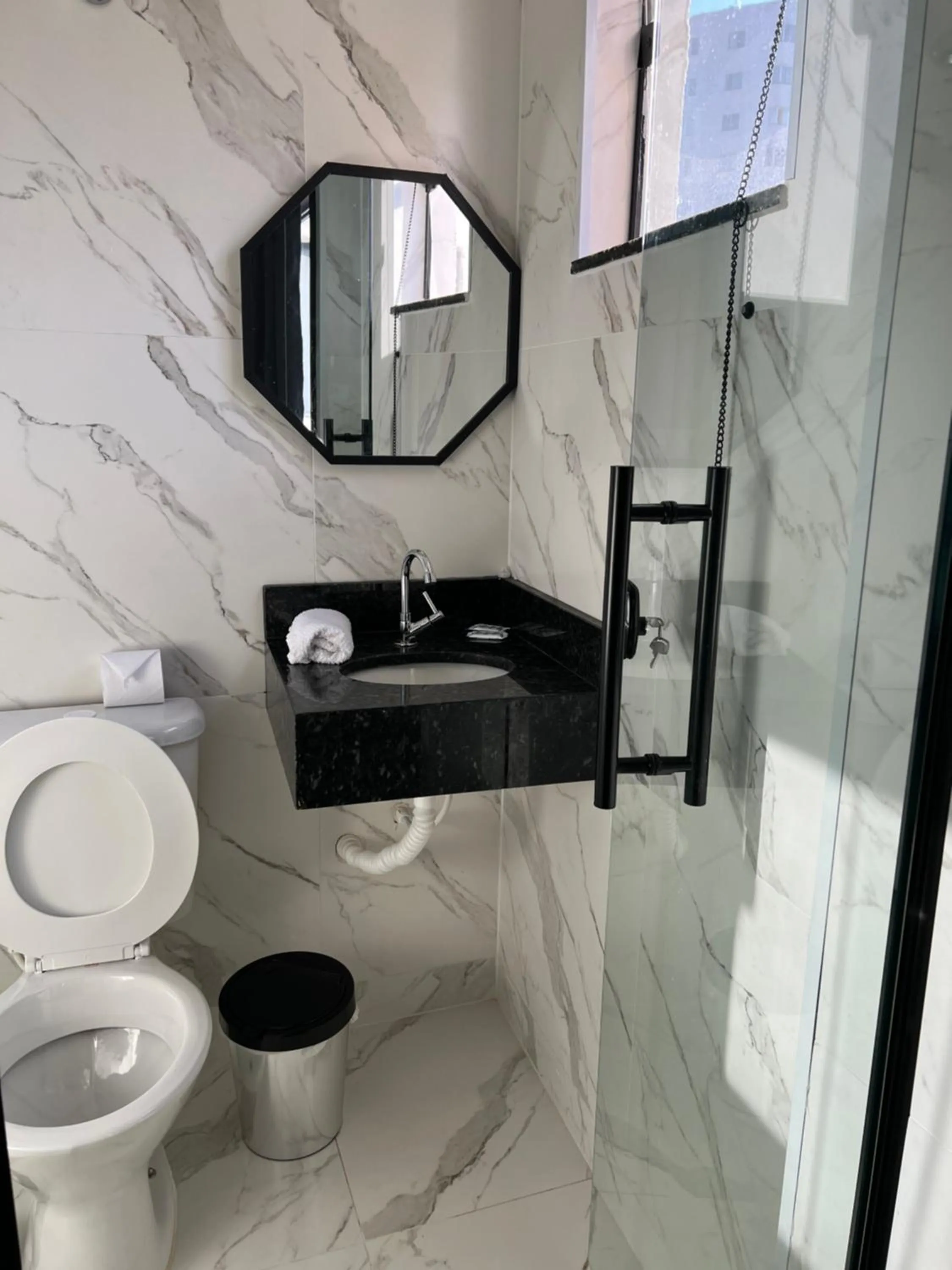 Bathroom in Hotel Pousada Colliseu