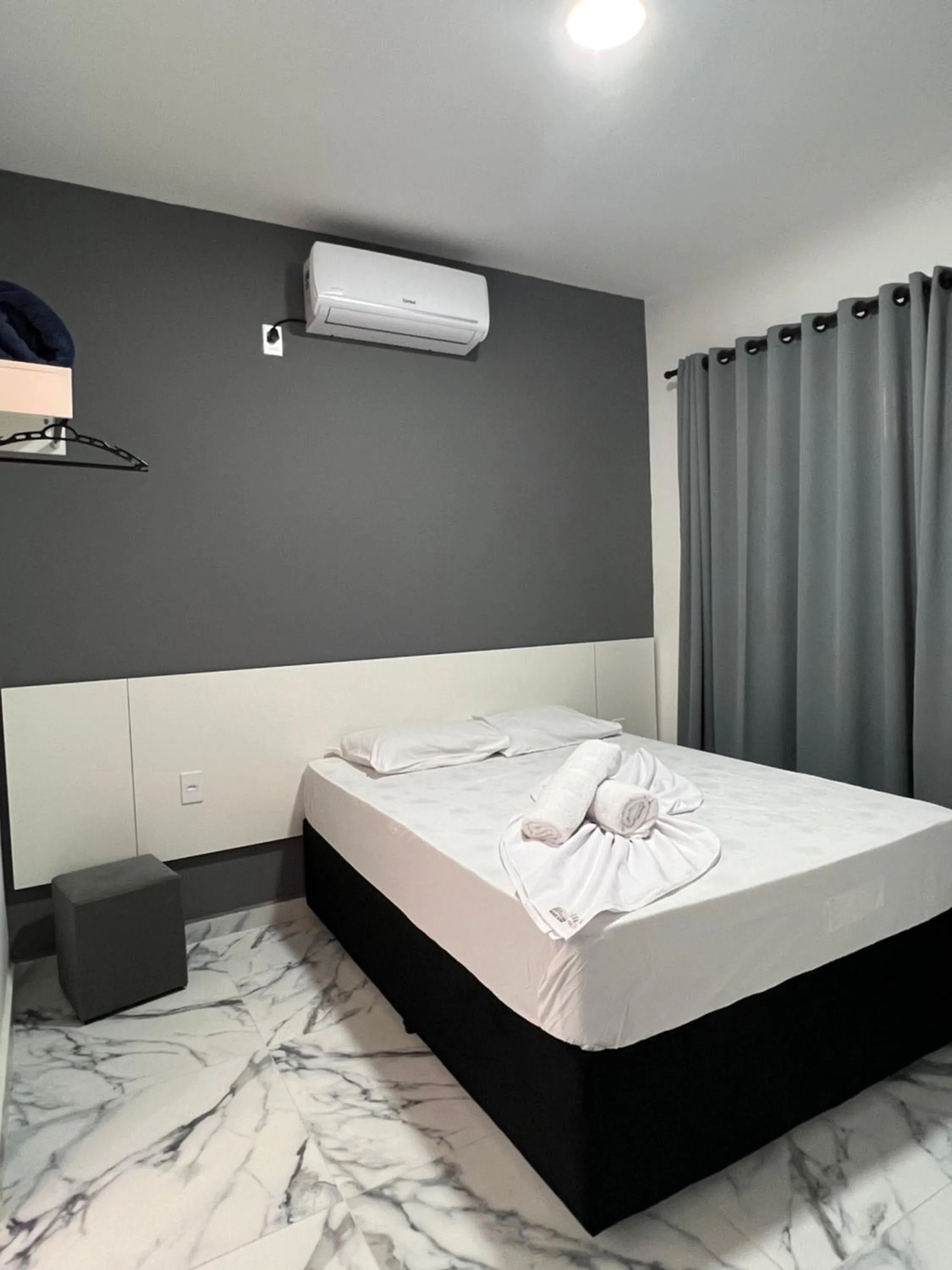 Bed in Hotel Pousada Colliseu