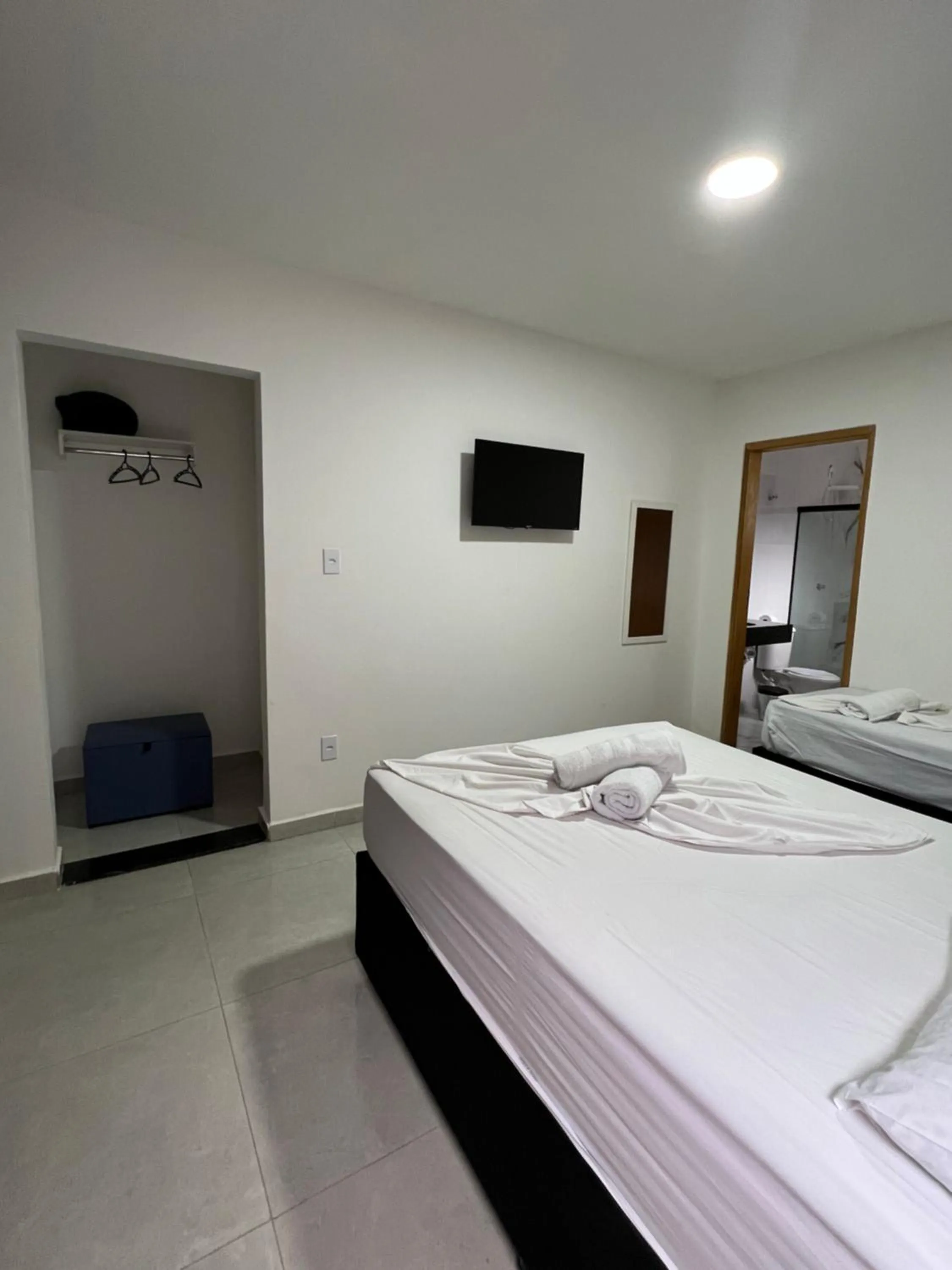 Bed in Hotel Pousada Colliseu