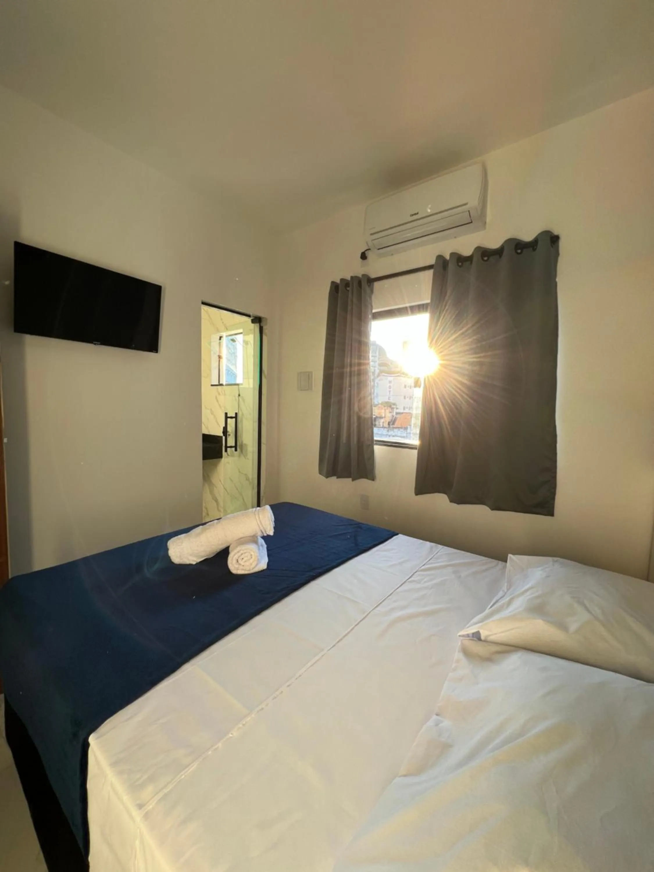 Bed in Hotel Pousada Colliseu