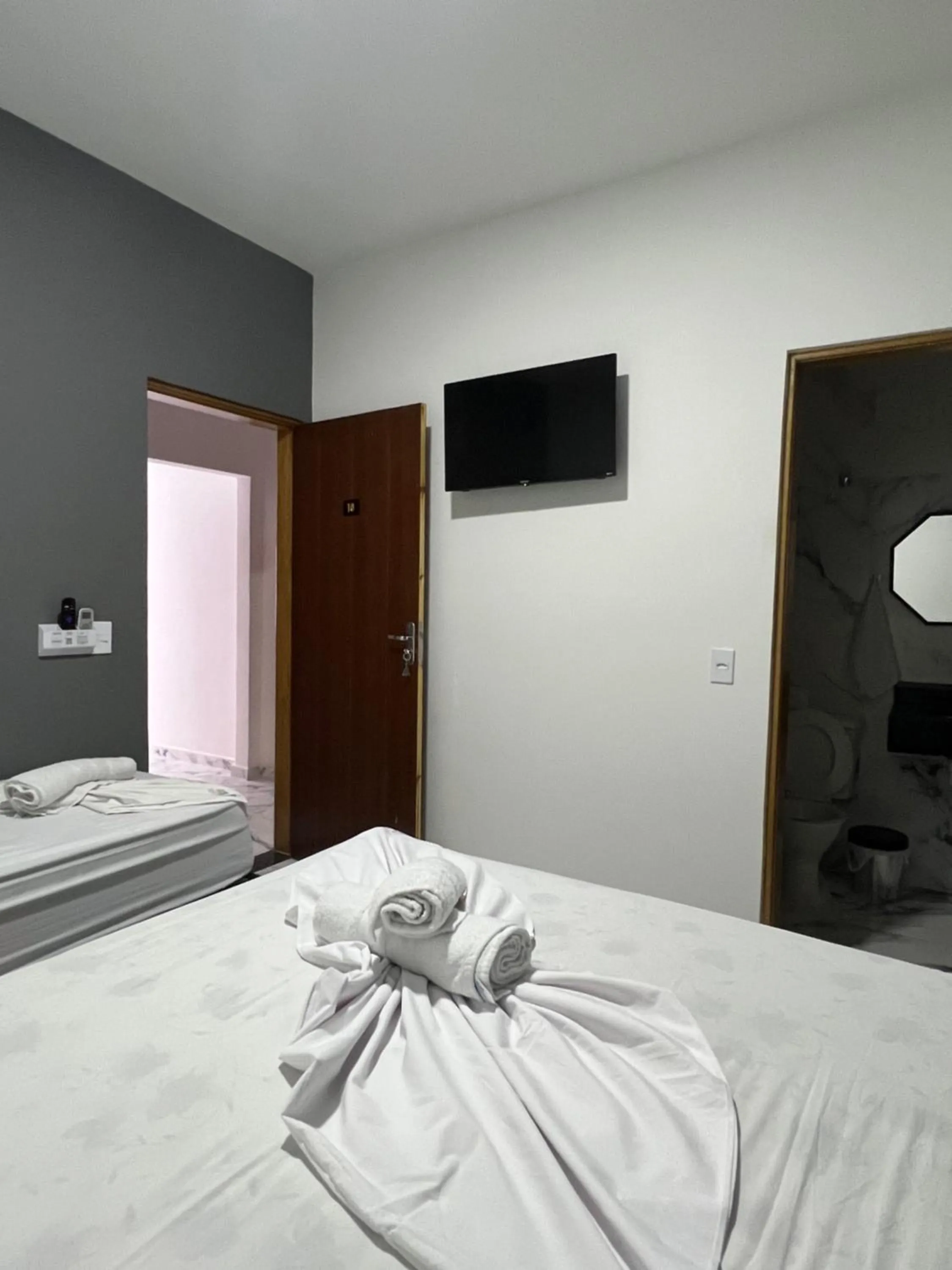 Bed in Hotel Pousada Colliseu