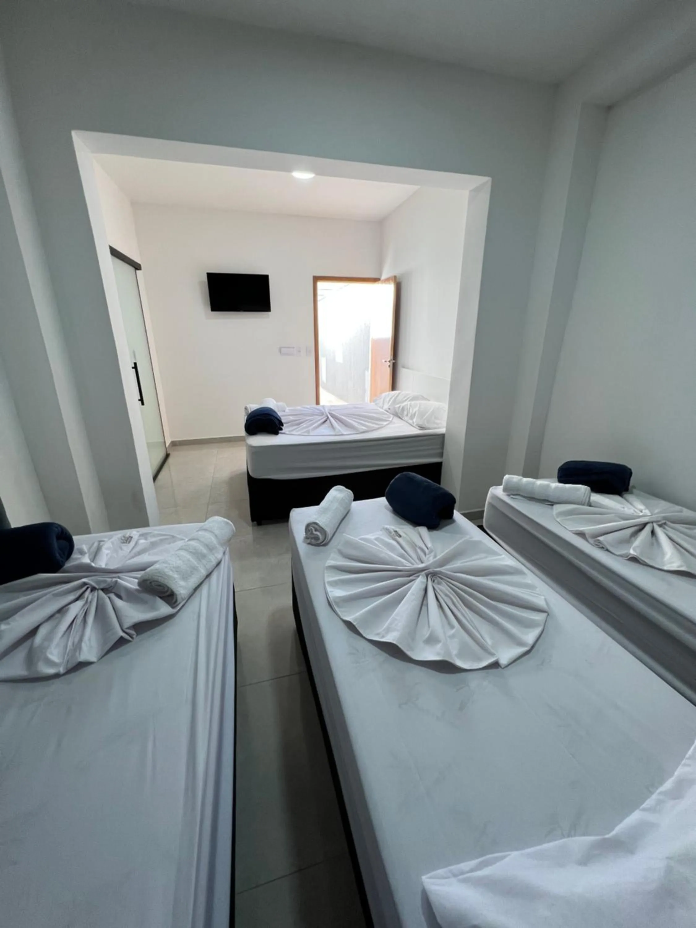 Bed in Hotel Pousada Colliseu