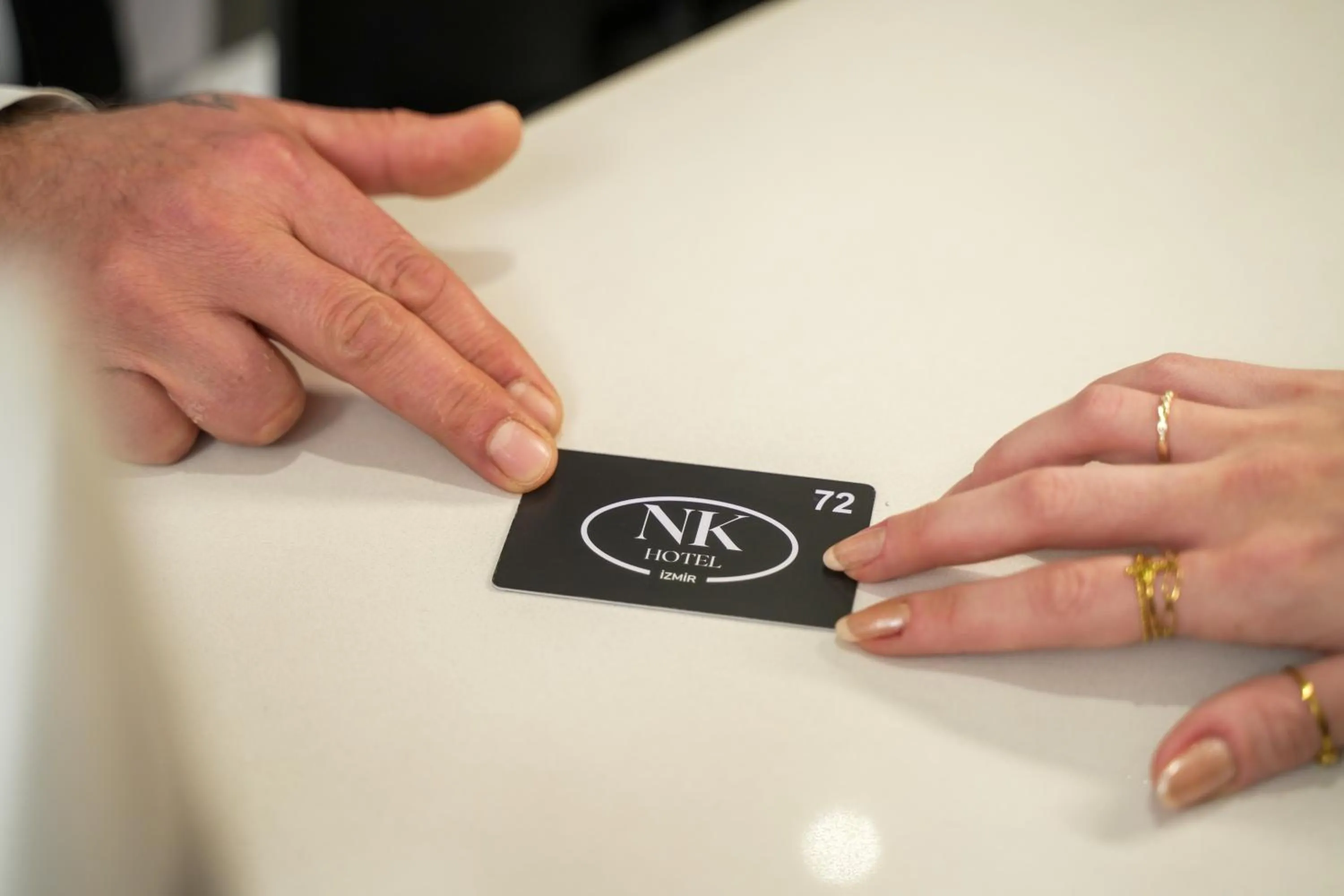 Property logo or sign in NK Hotel