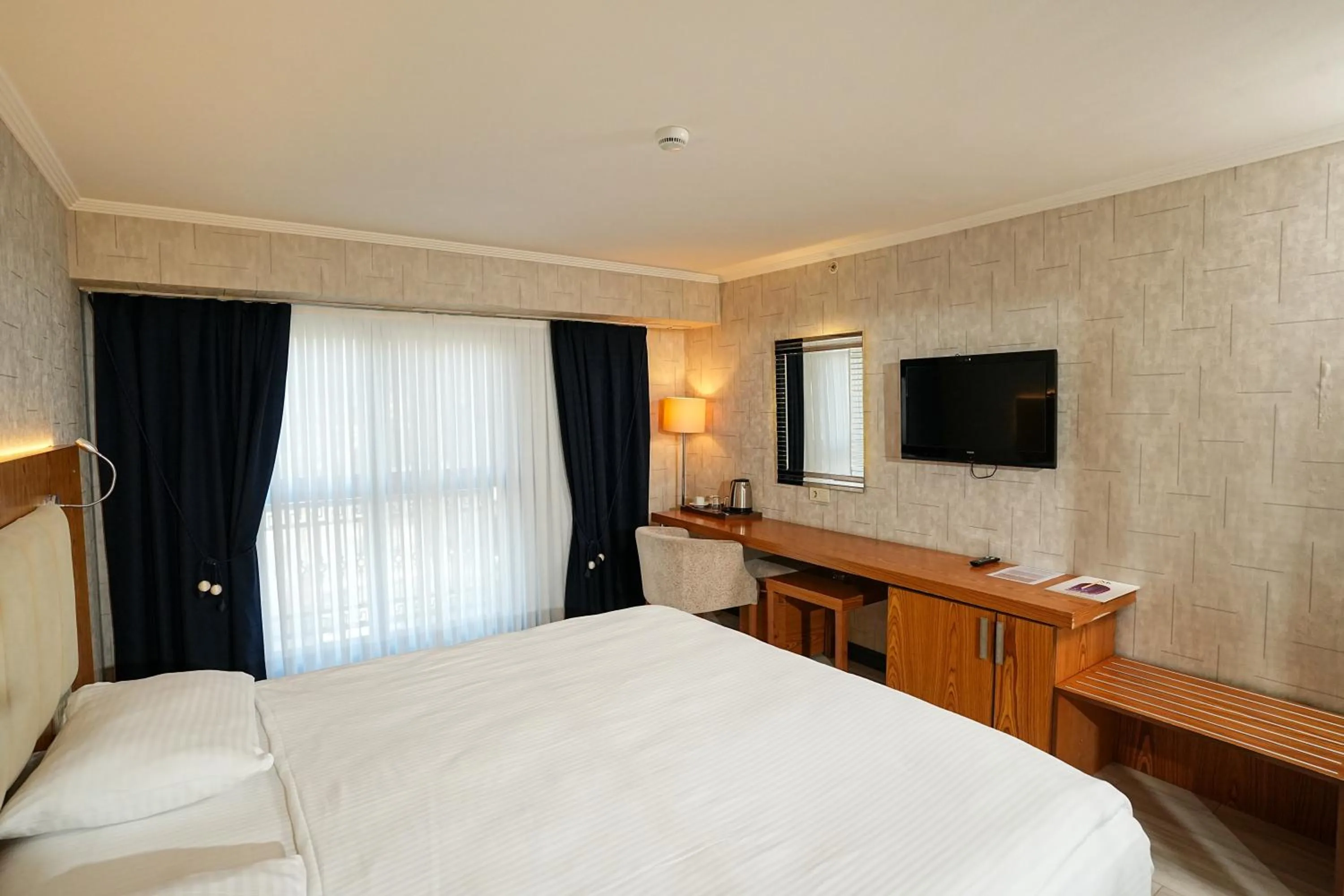 Photo of the whole room, Bed in NK Hotel