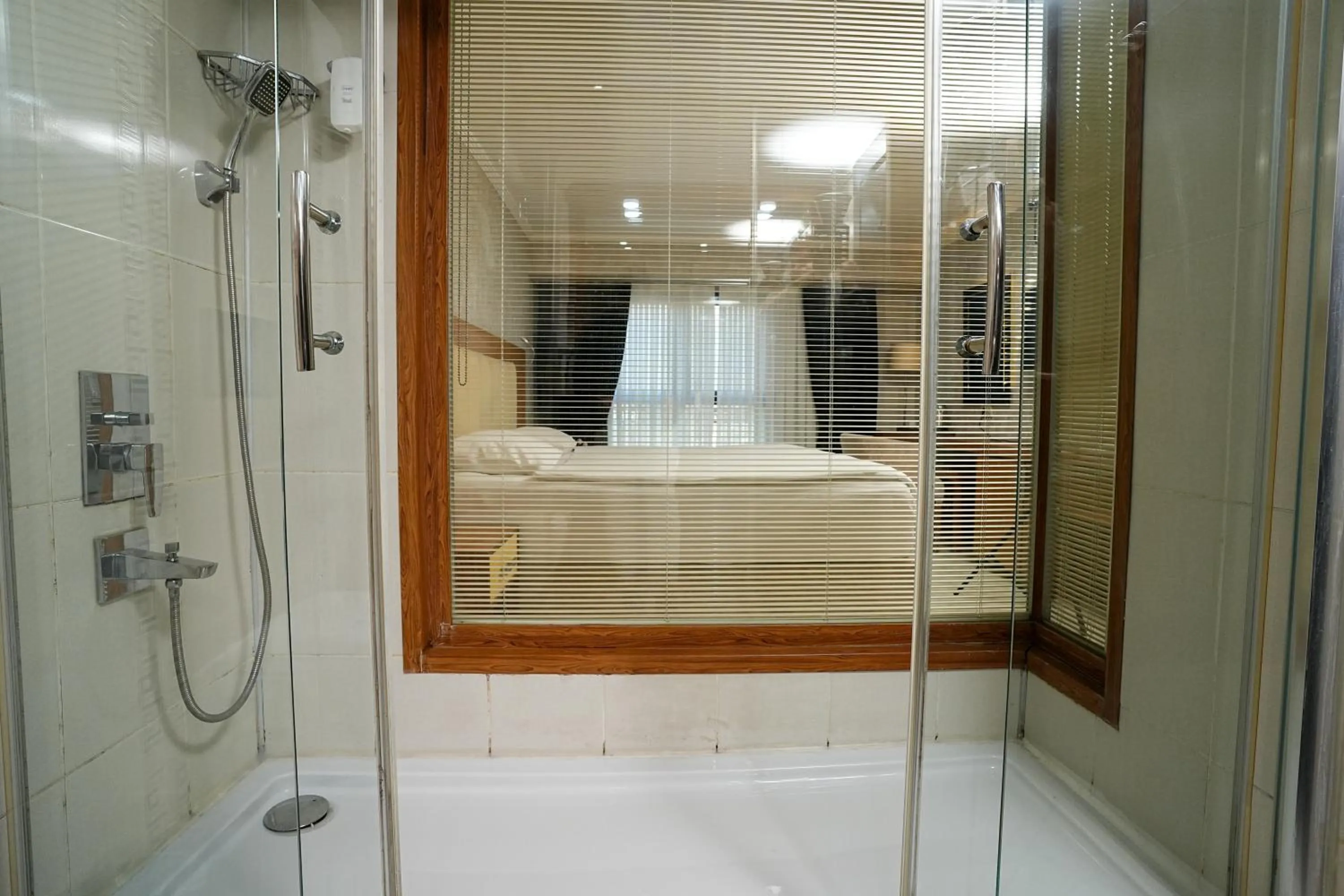 Shower, Bed in NK Hotel
