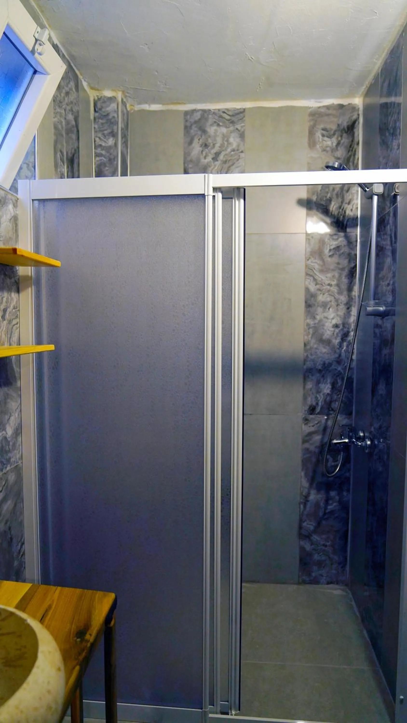 Shower in Alpha Stone House