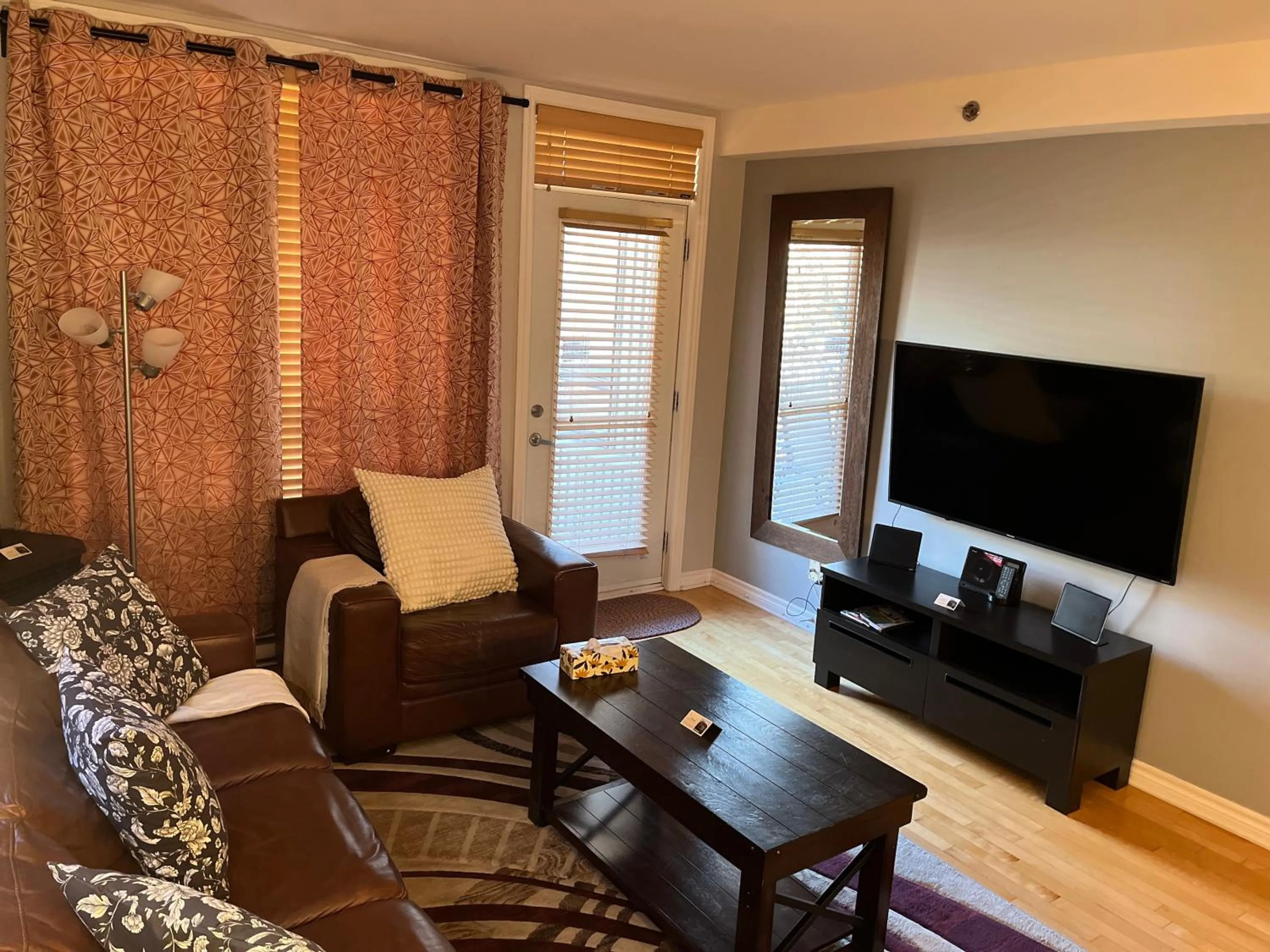 Living room in ApartHotelMontreal by Les Terrasses Saint Urbain 2225I2