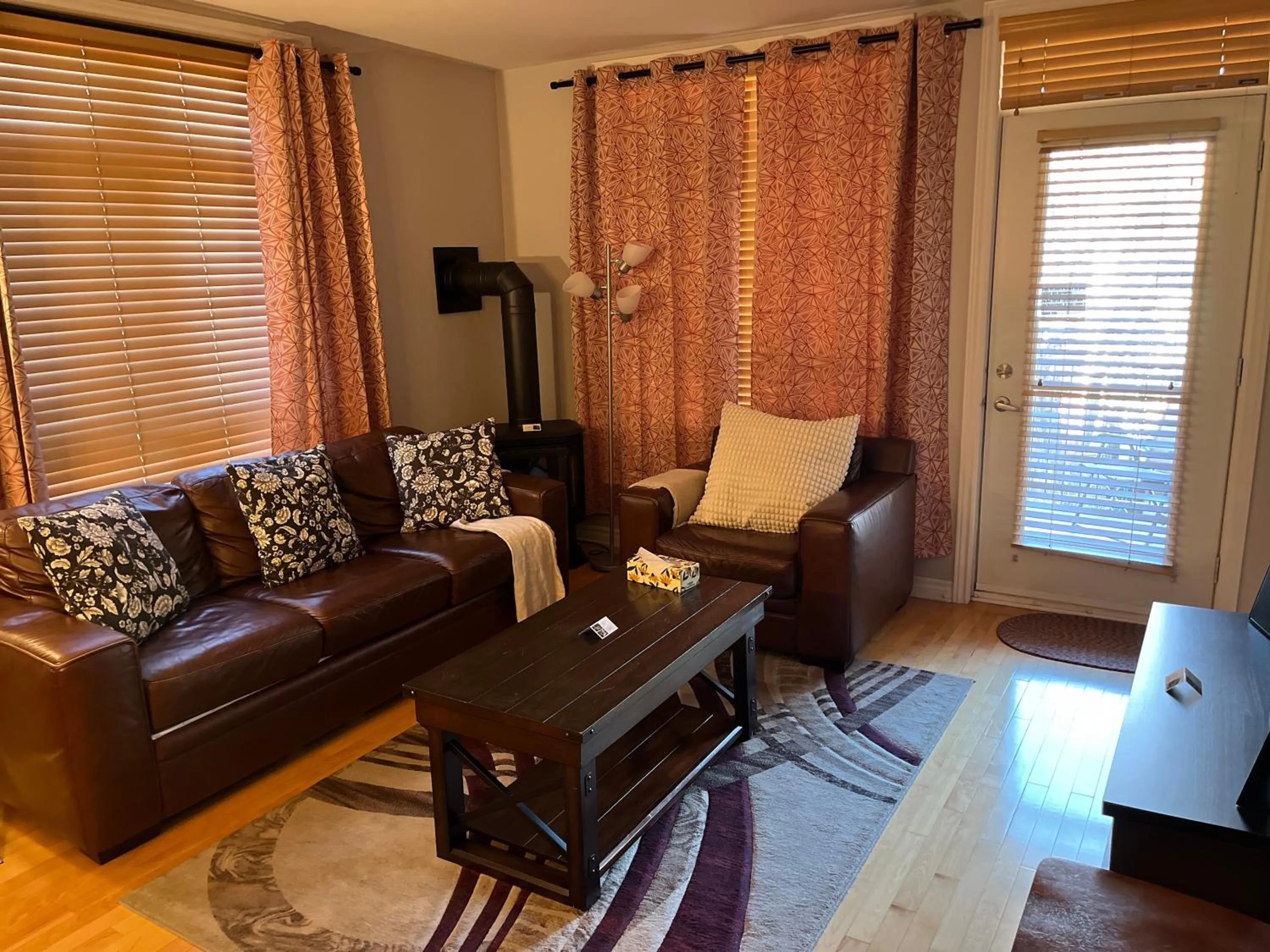 Living room in ApartHotelMontreal by Les Terrasses Saint Urbain 2225I2