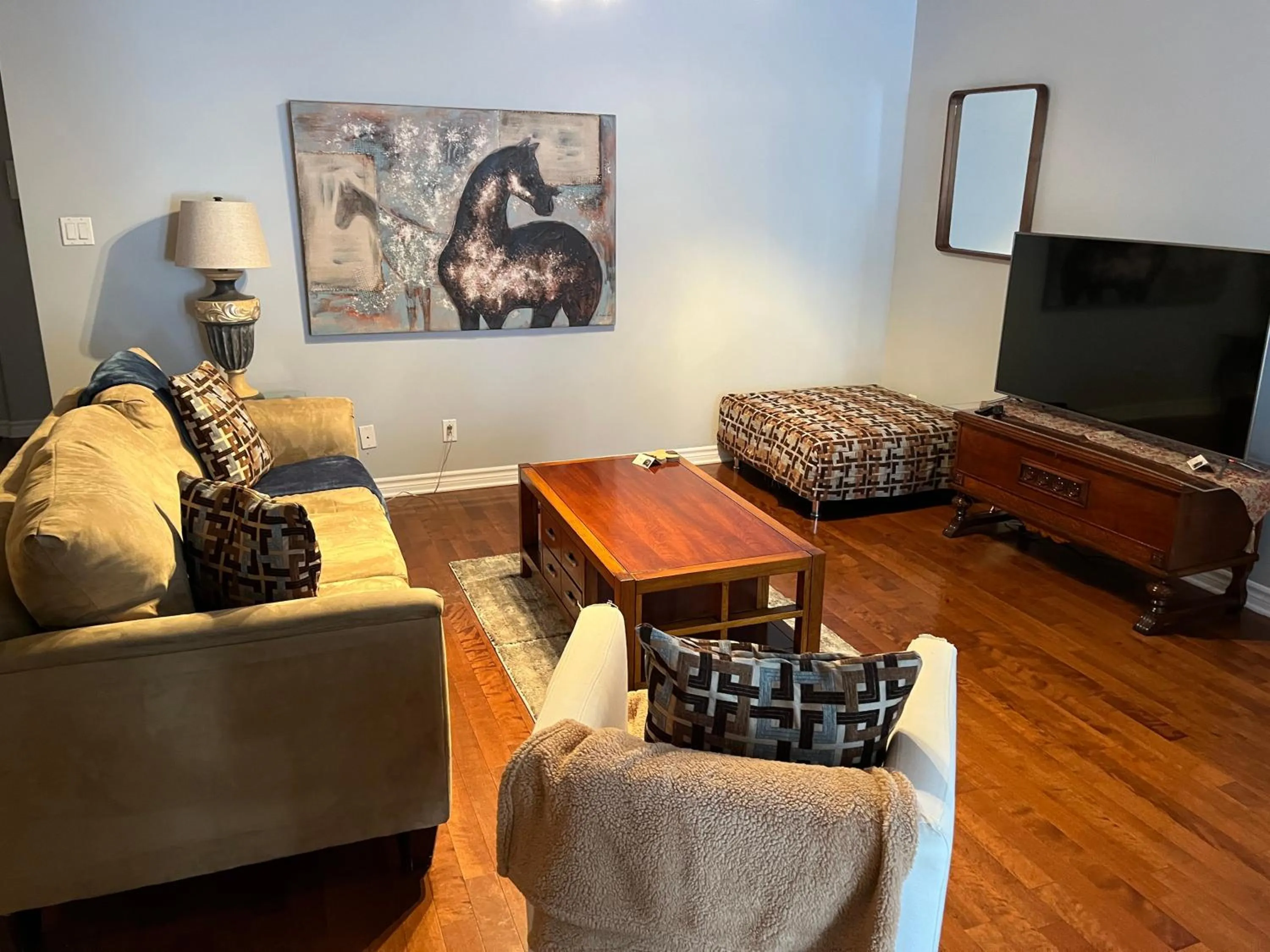 Living room in ApartHotelMontreal by Les Terrasses Saint Urbain 2225I2