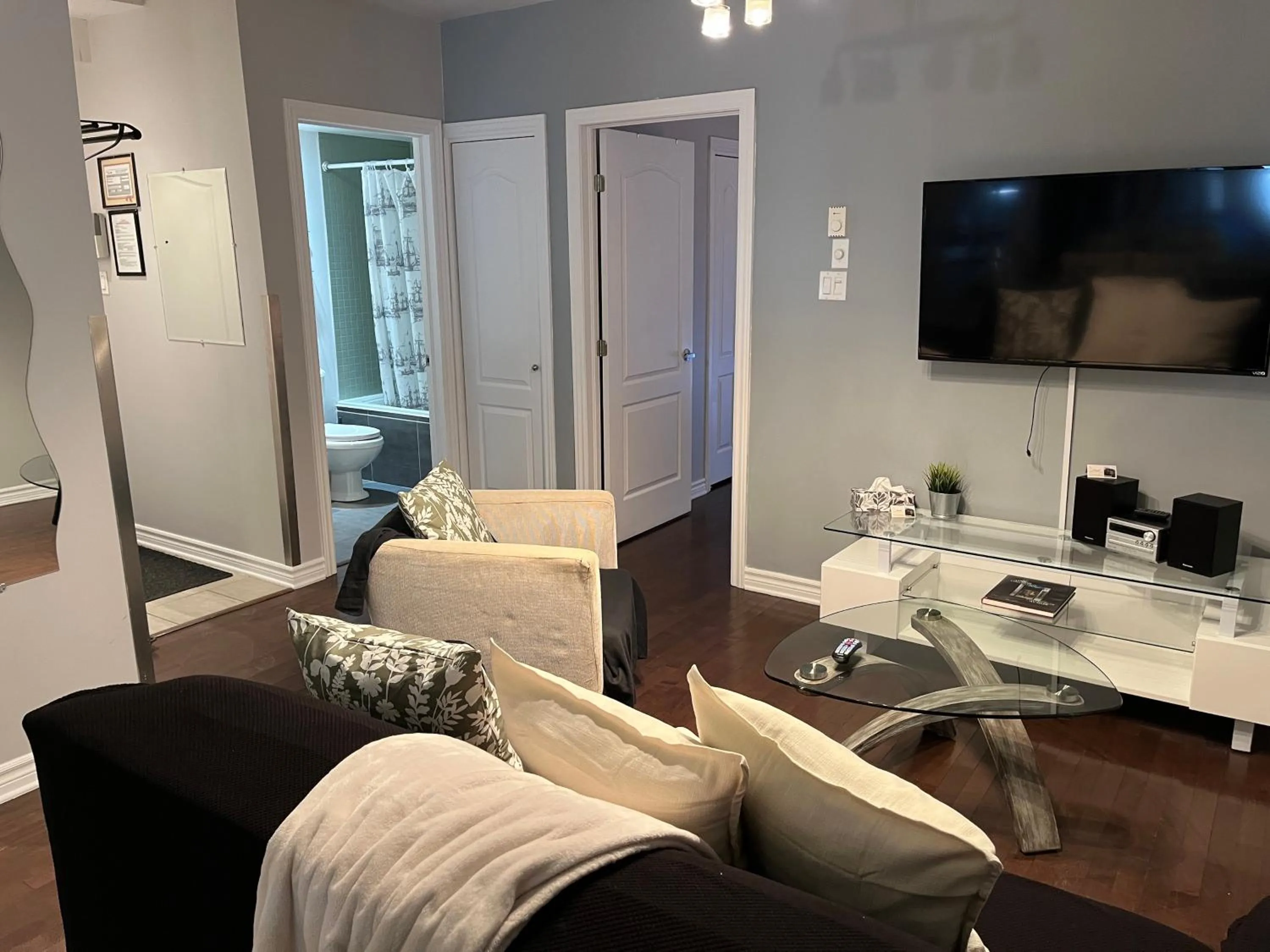 Living room in ApartHotelMontreal by Les Terrasses Saint Urbain 2225I2