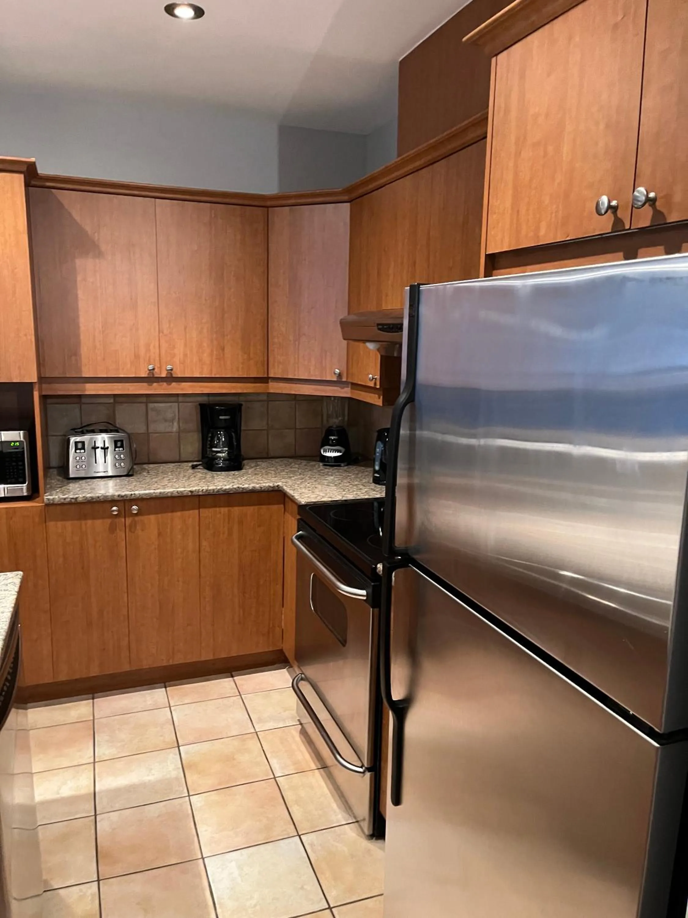 kitchen in ApartHotelMontreal by Les Terrasses Saint Urbain 2225I2