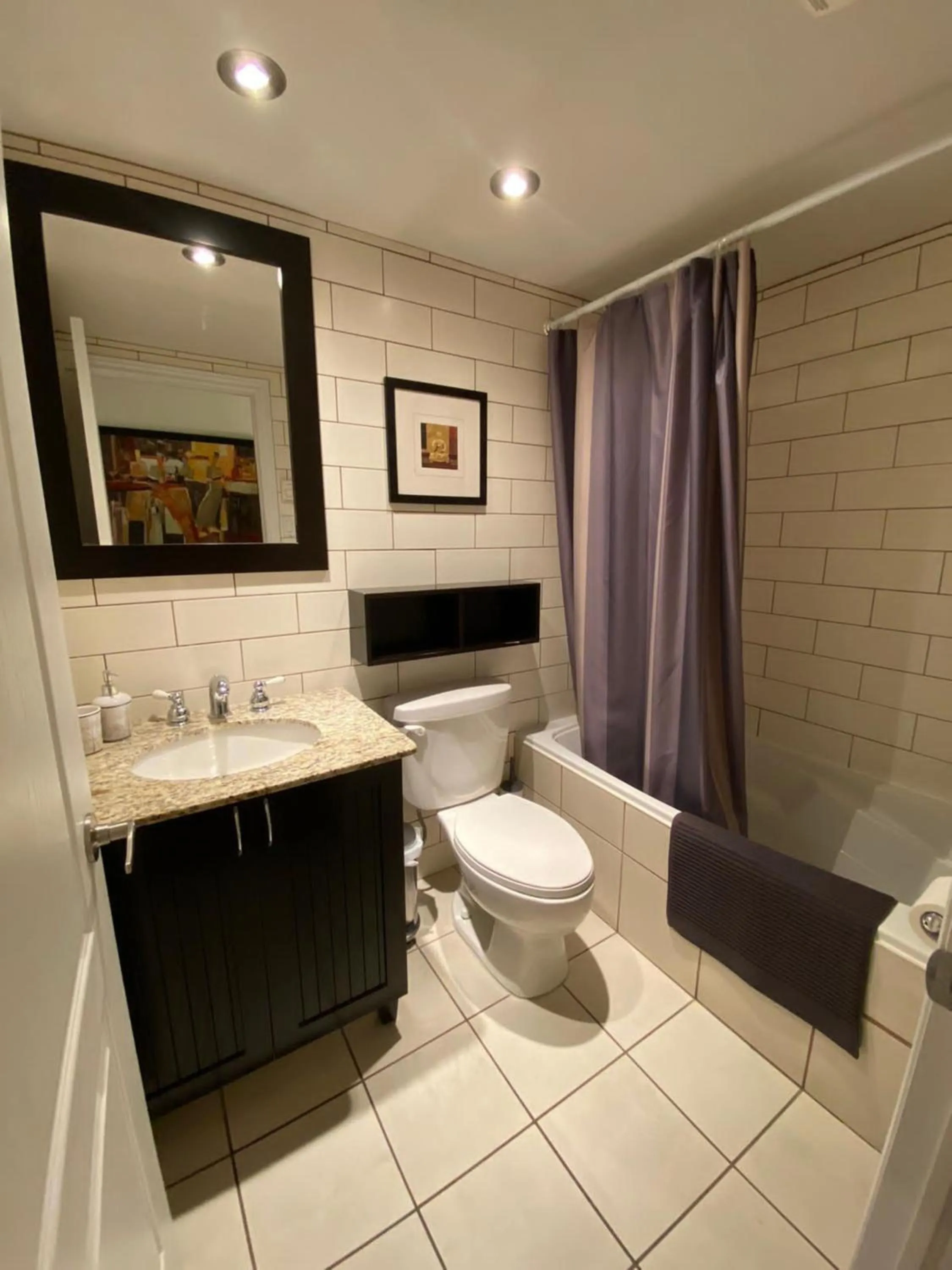 Bathroom in ApartHotelMontreal by Les Terrasses Saint Urbain 2225I2