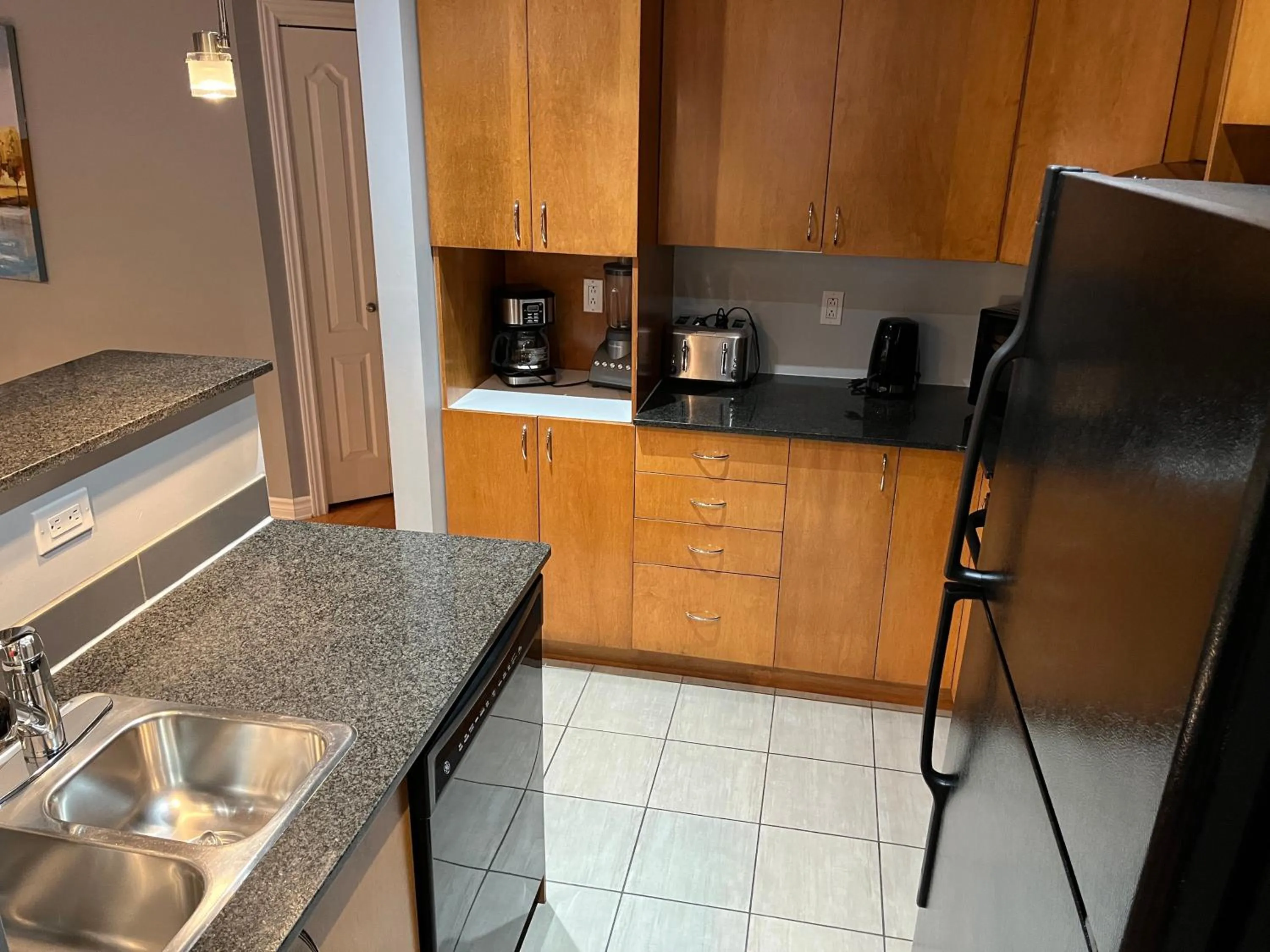 kitchen in ApartHotelMontreal by Les Terrasses Saint Urbain 2225I2