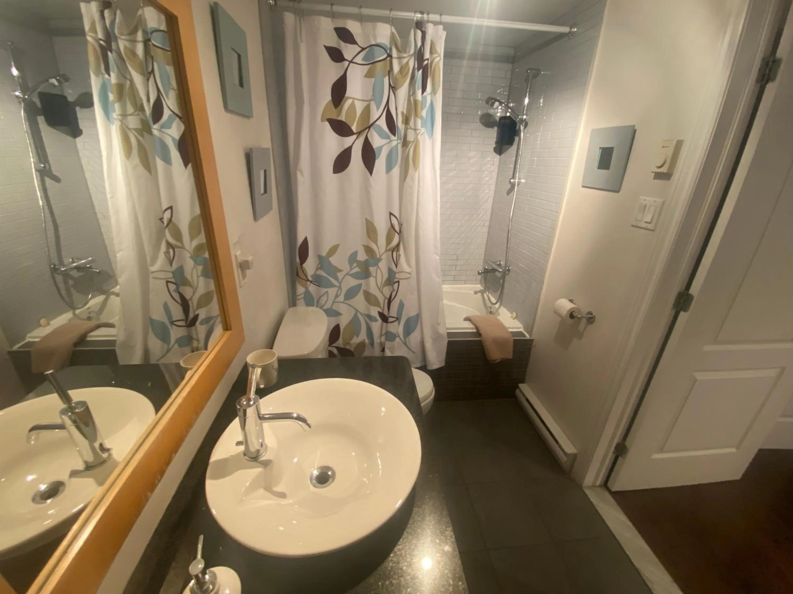 Shower in ApartHotelMontreal by Les Terrasses Saint Urbain 2225I2