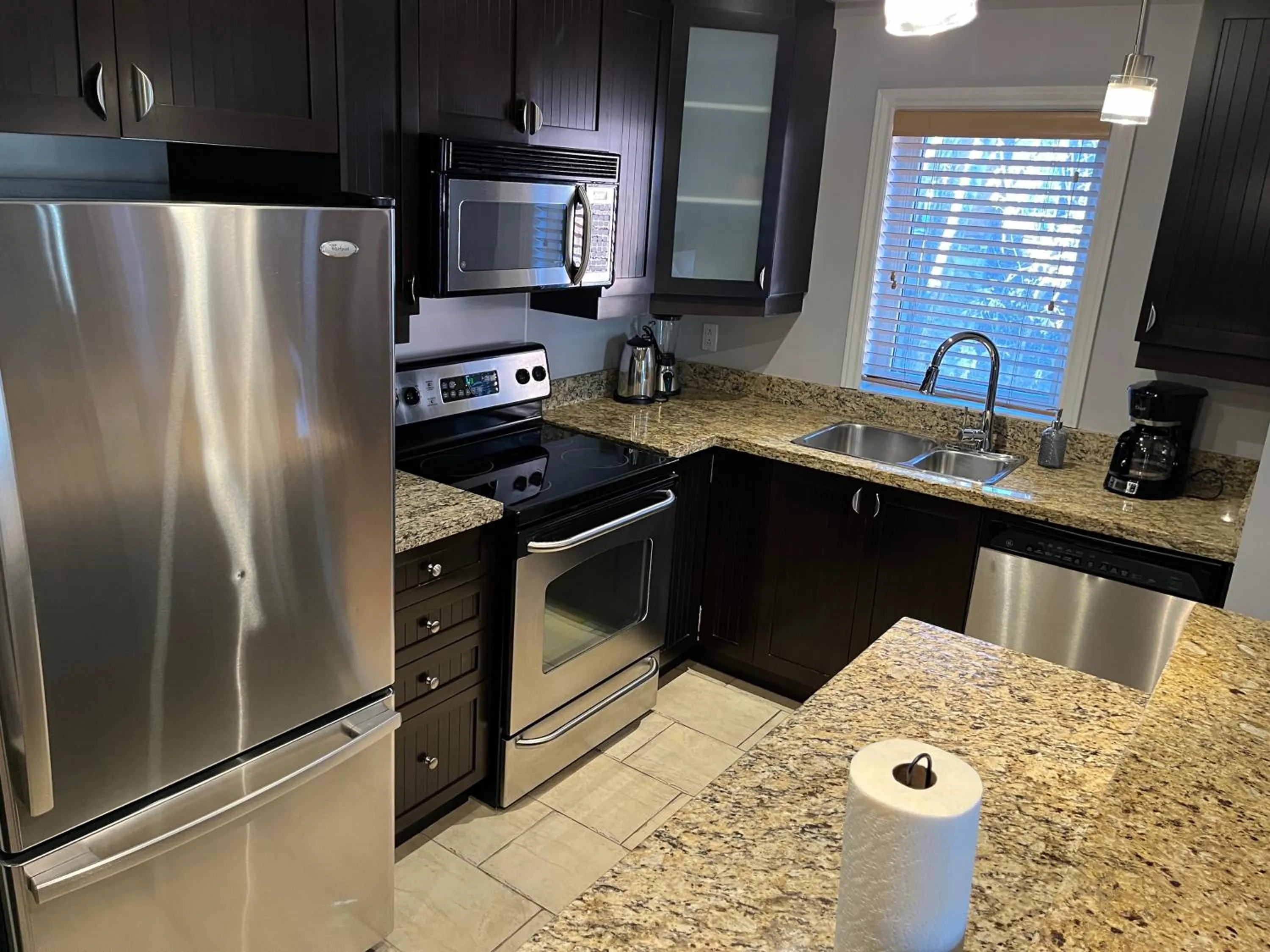 kitchen in ApartHotelMontreal by Les Terrasses Saint Urbain 2225I2