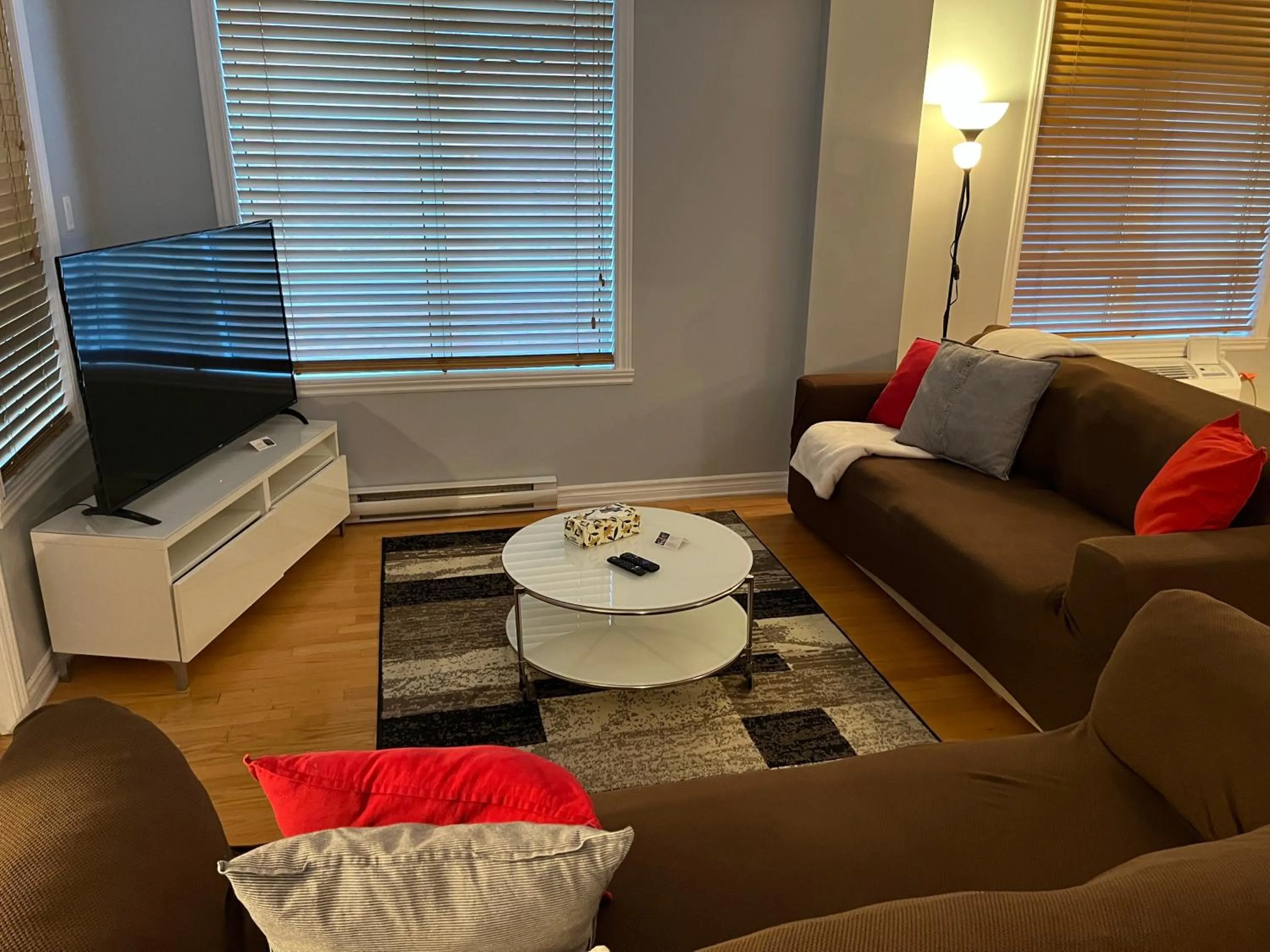 Living room in ApartHotelMontreal by Les Terrasses Saint Urbain 2225I2