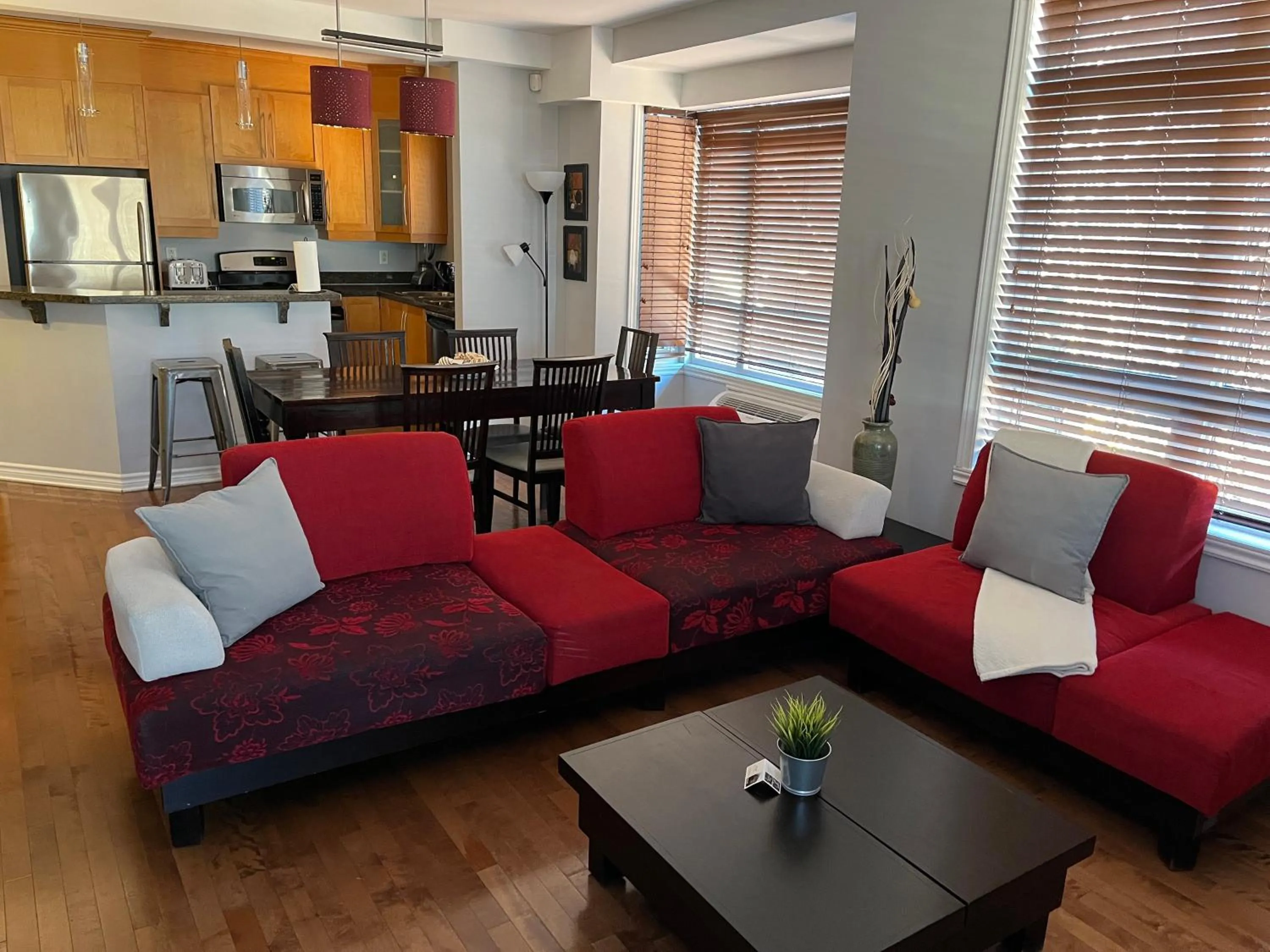 Living room in ApartHotelMontreal by Les Terrasses Saint Urbain 2225I2