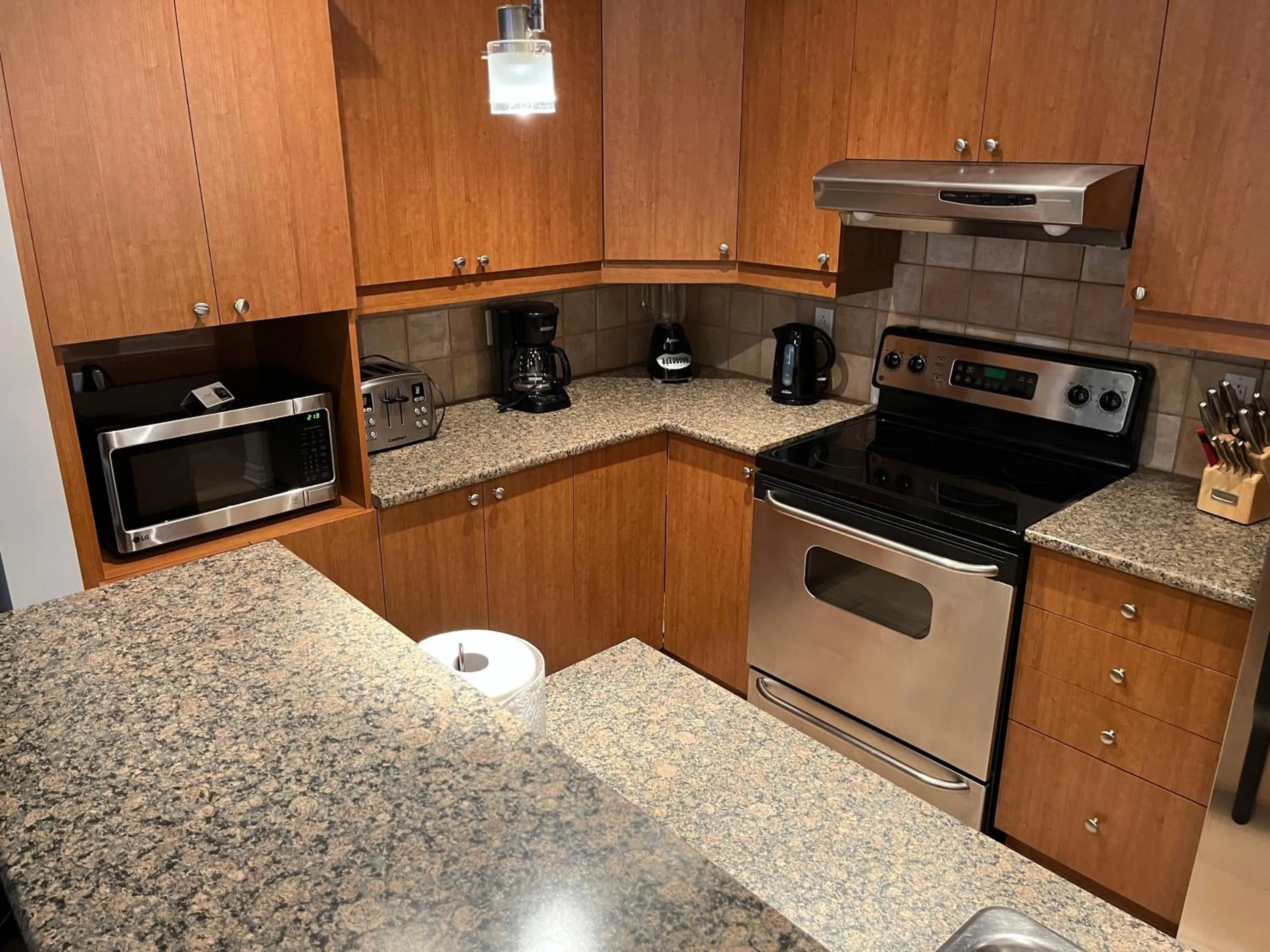 kitchen in ApartHotelMontreal by Les Terrasses Saint Urbain 2225I2