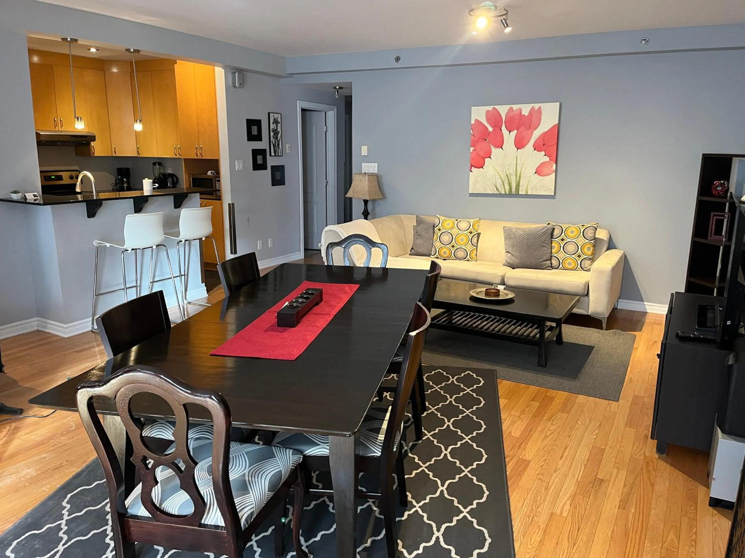 Living room in ApartHotelMontreal by Les Terrasses Saint Urbain 2225I2