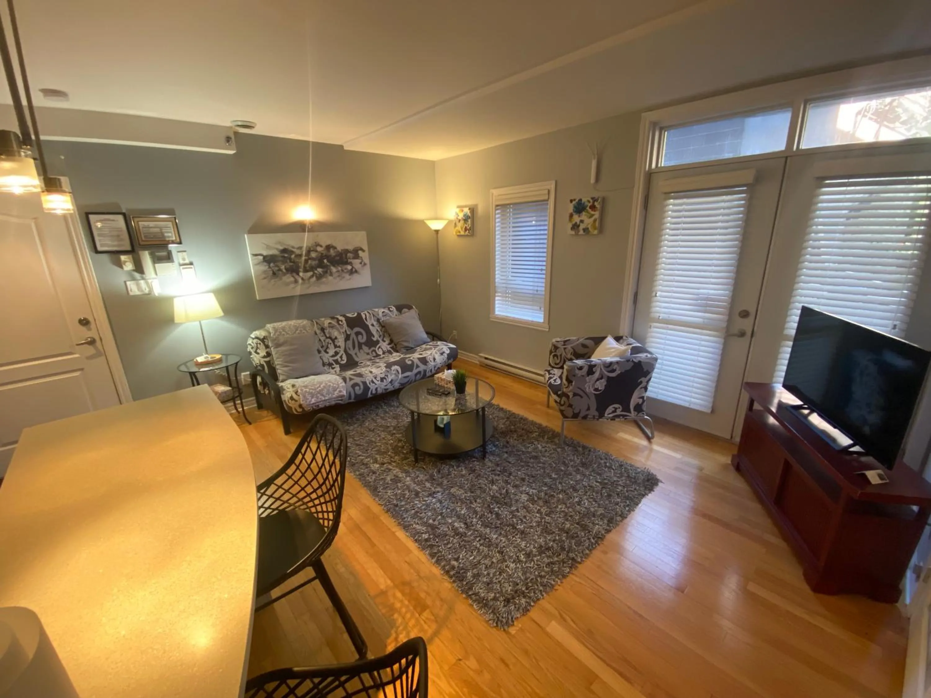 TV and multimedia in ApartHotelMontreal by Les Terrasses Saint Urbain 2225I2