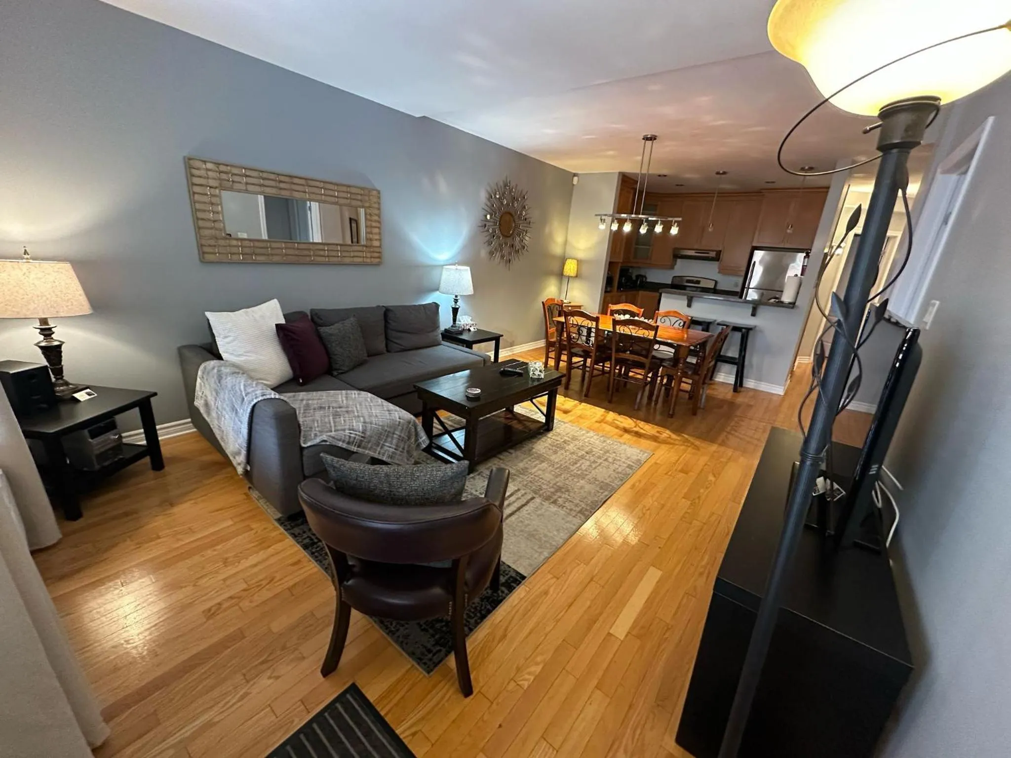 Living room in ApartHotelMontreal by Les Terrasses Saint Urbain 2225I2