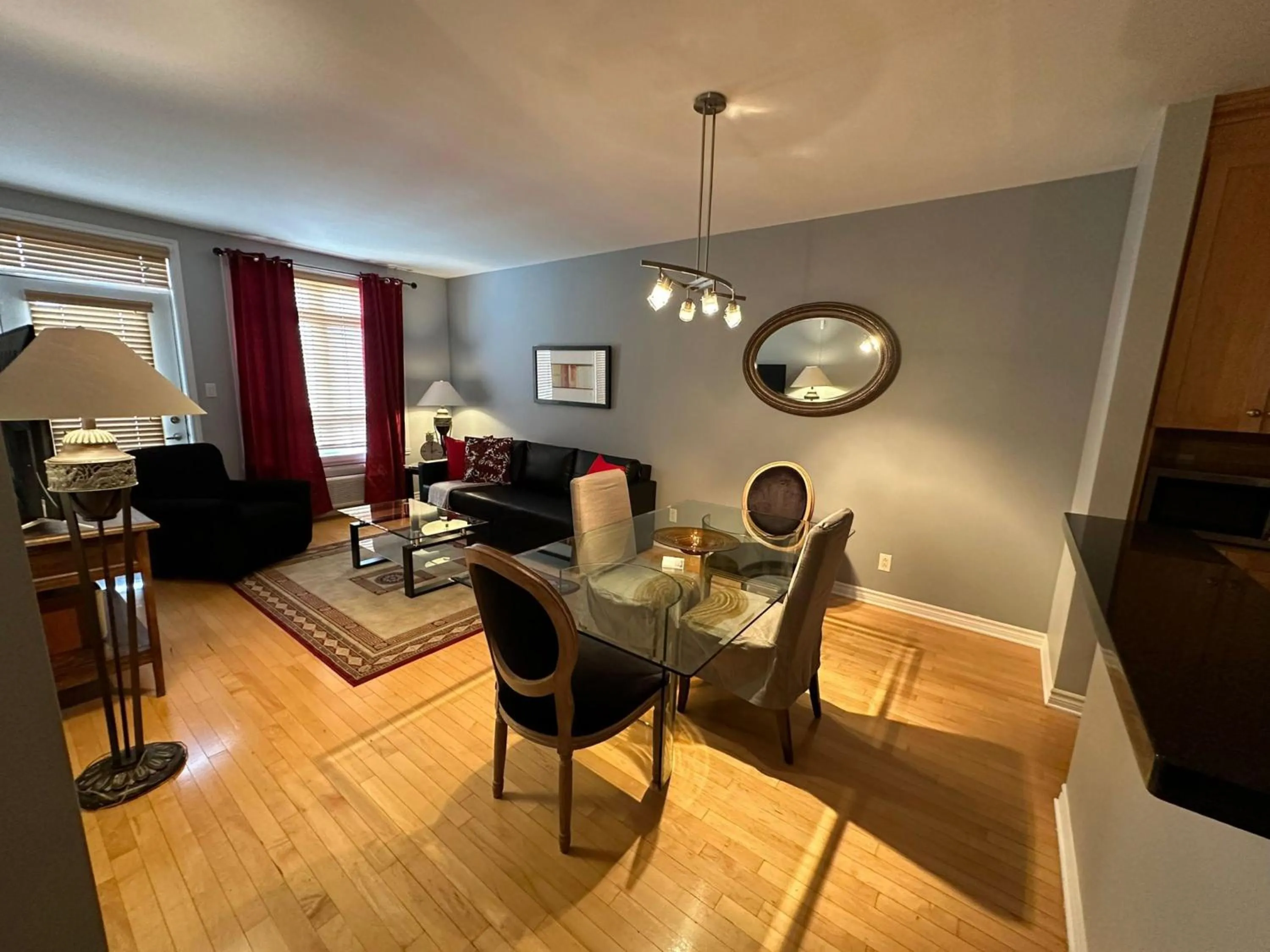Living room in ApartHotelMontreal by Les Terrasses Saint Urbain 2225I2