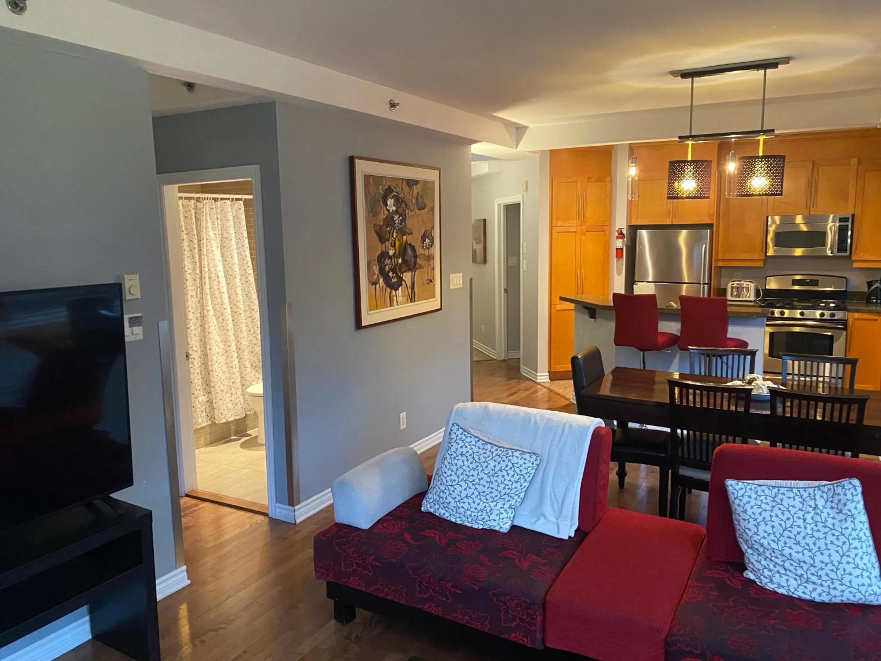 Living room in ApartHotelMontreal by Les Terrasses Saint Urbain 2225I2