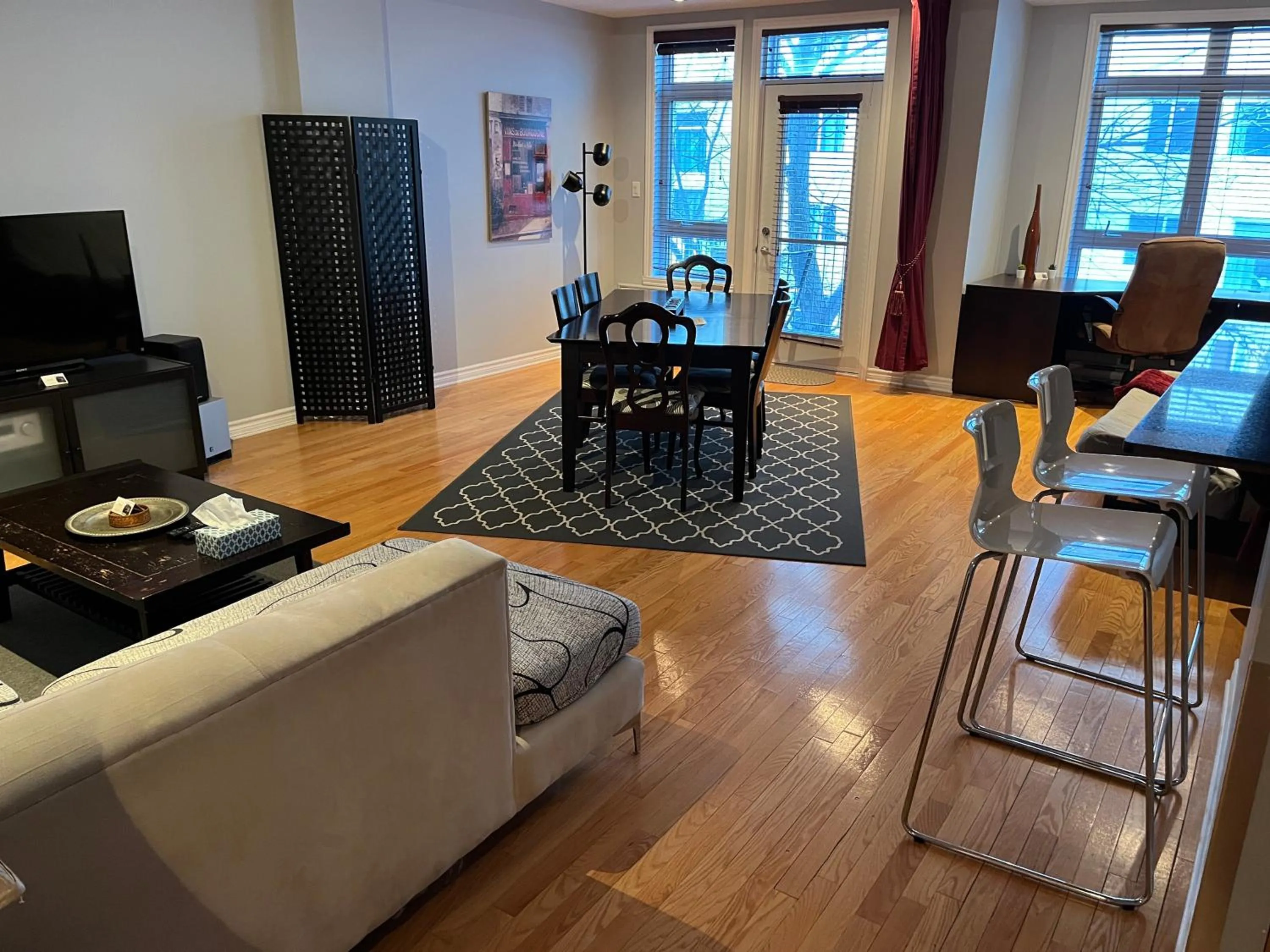 Living room in ApartHotelMontreal by Les Terrasses Saint Urbain 2225I2