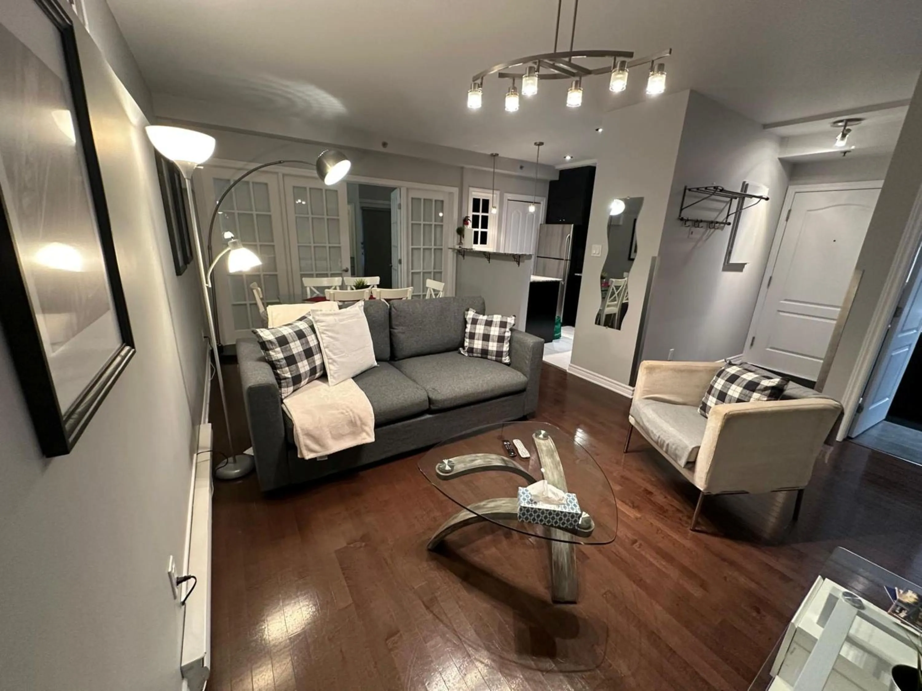 Living room in ApartHotelMontreal by Les Terrasses Saint Urbain 2225I2