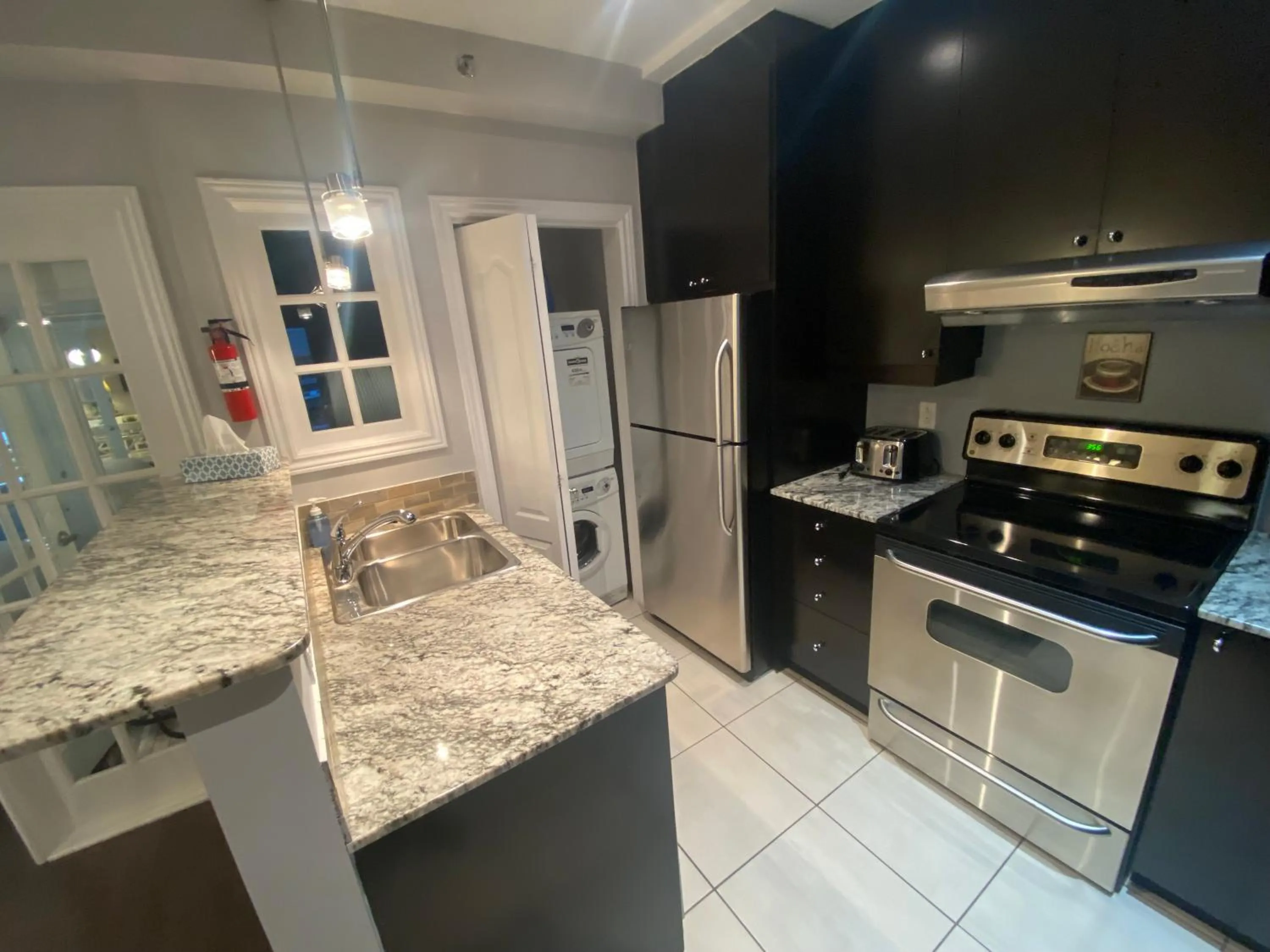 kitchen in ApartHotelMontreal by Les Terrasses Saint Urbain 2225I2