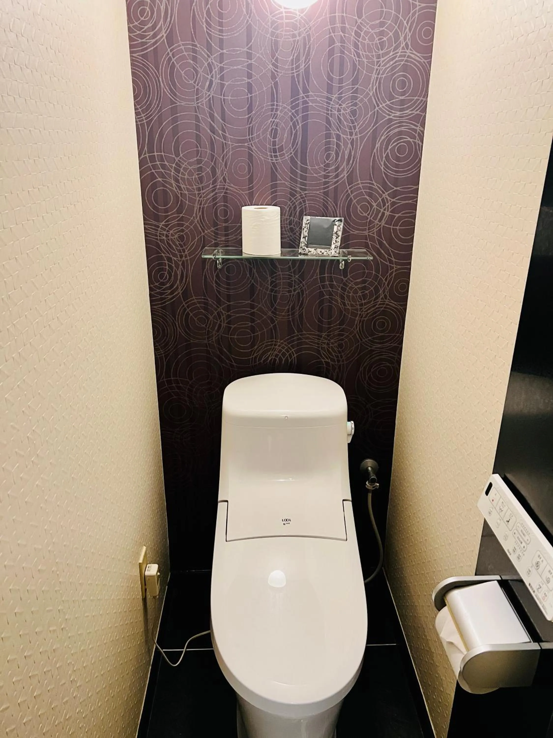 Toilet in ホテル CROWN MOTEL