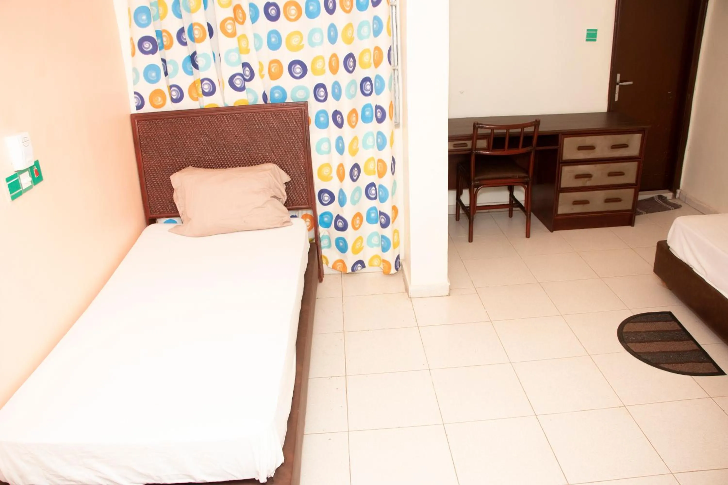 Bed in Alafia Hotel Ketou