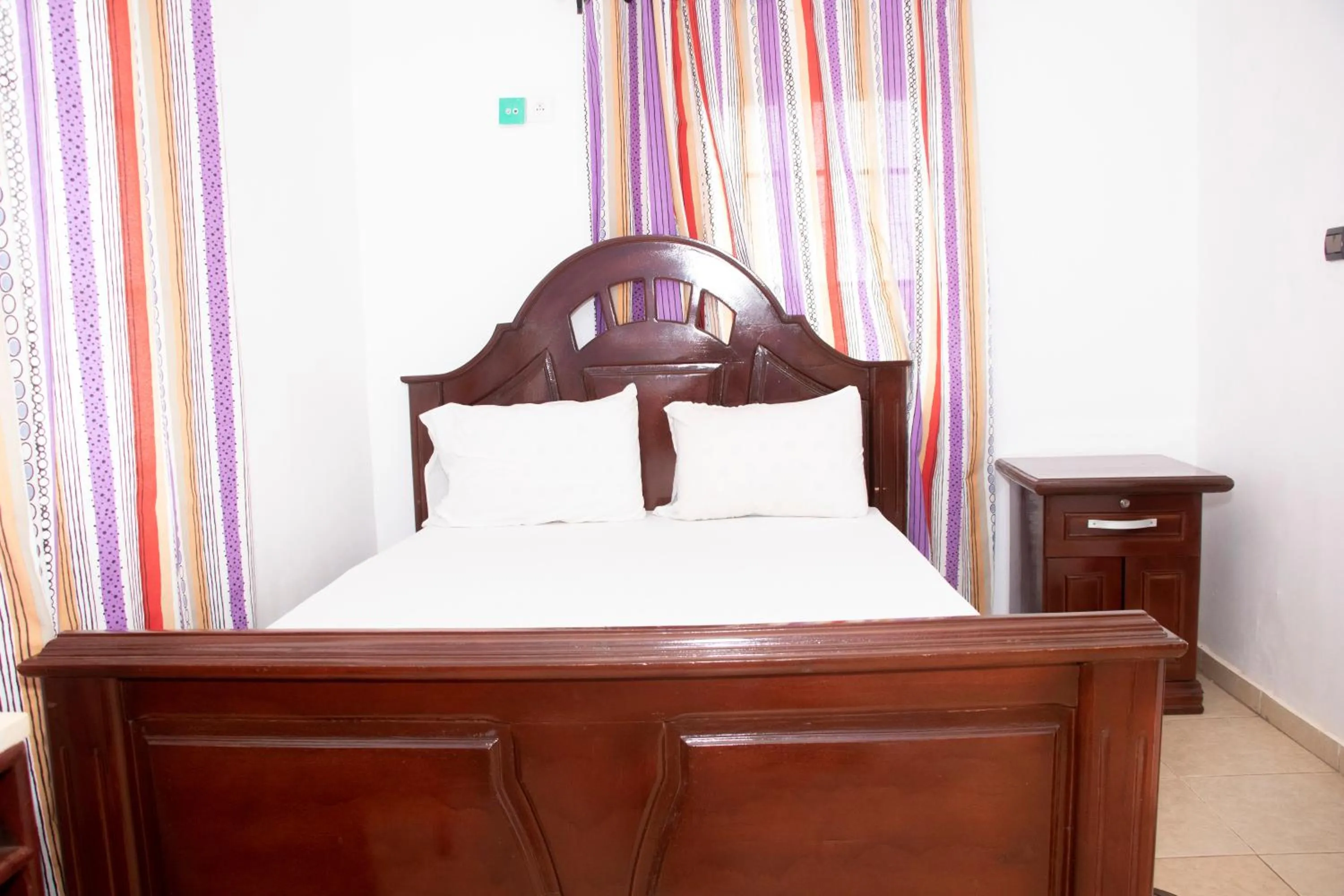 Bed in Alafia Hotel Ketou