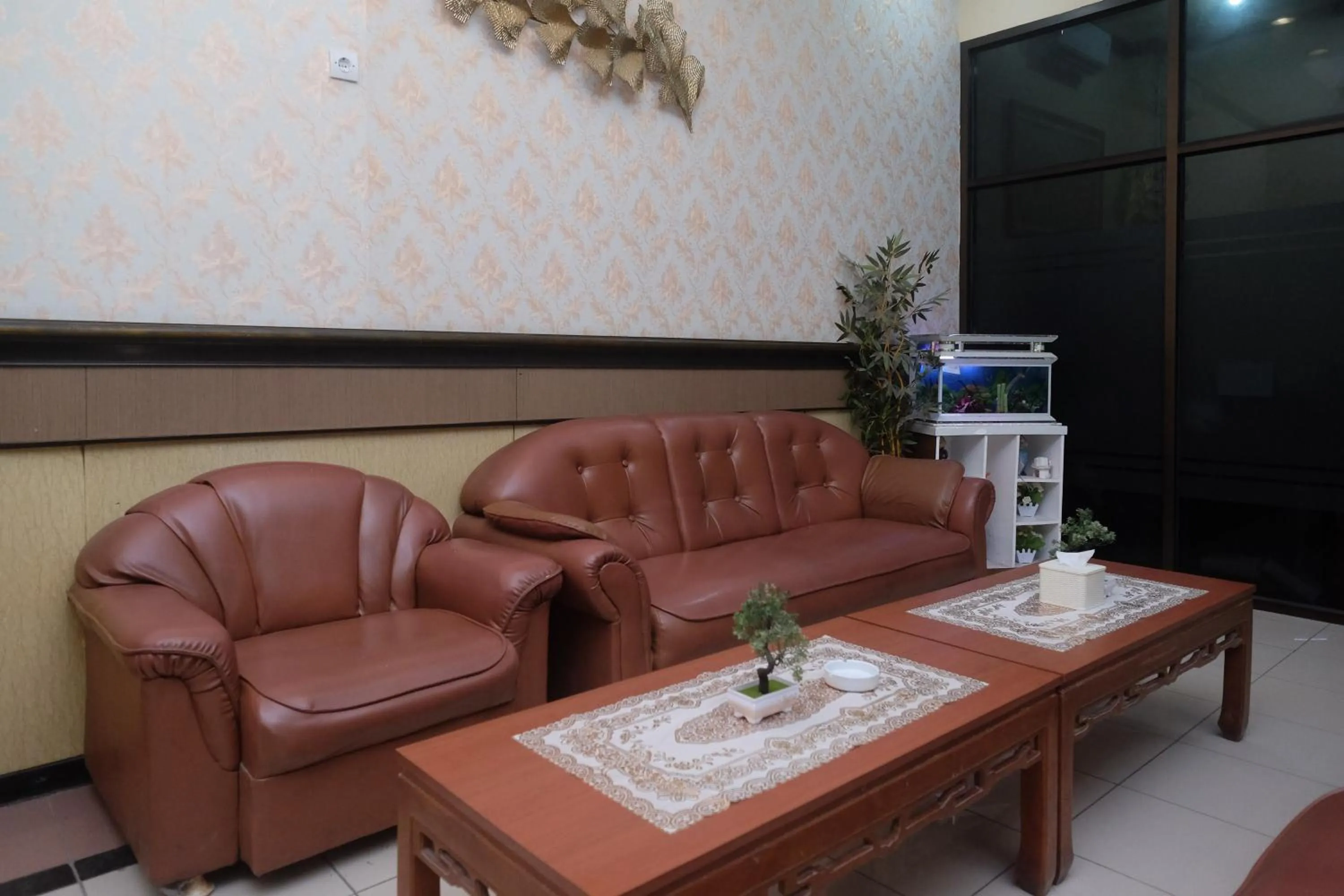 Seating area in Urbanview Hotel Dedy Jaya Brebes