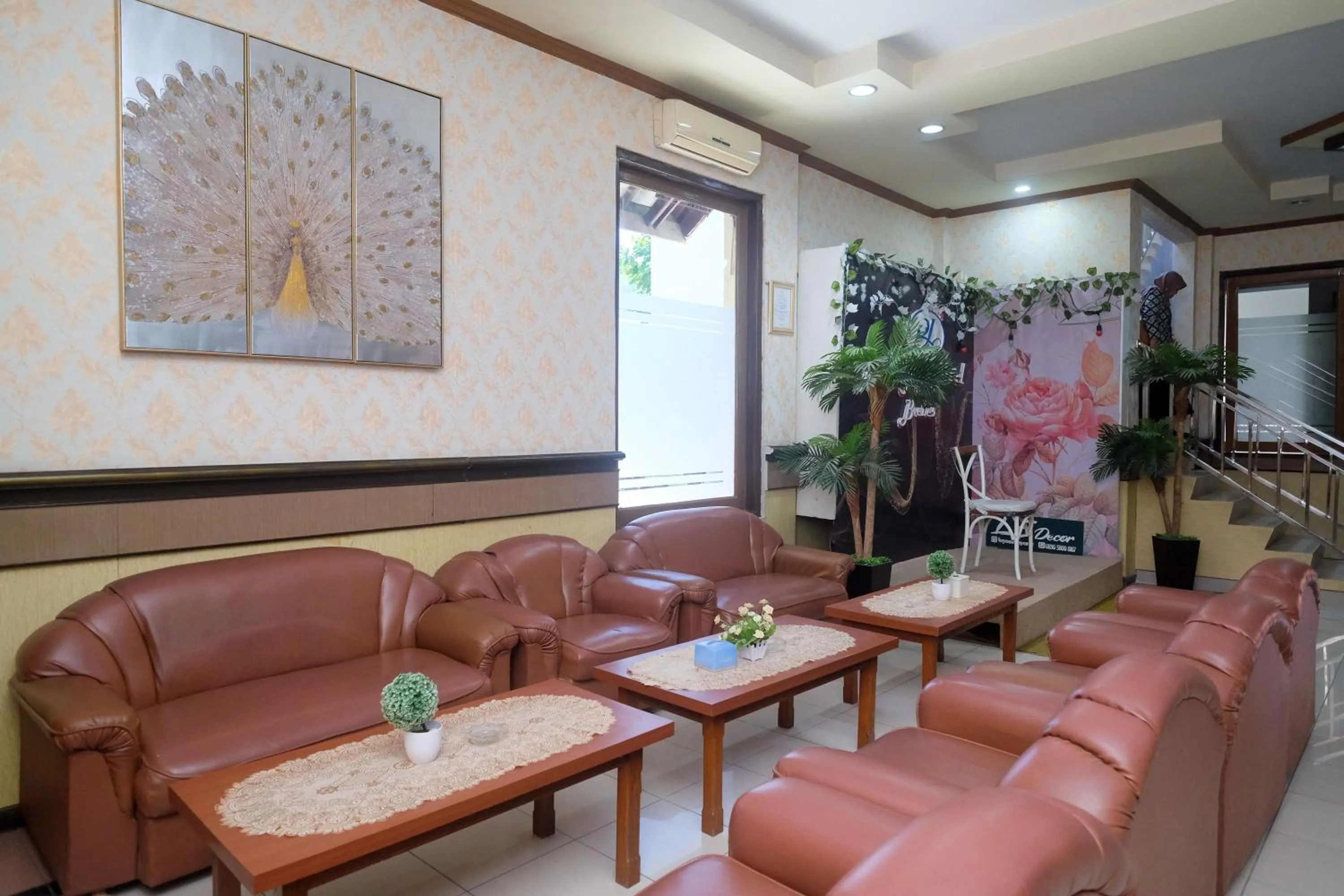 Seating area in Urbanview Hotel Dedy Jaya Brebes