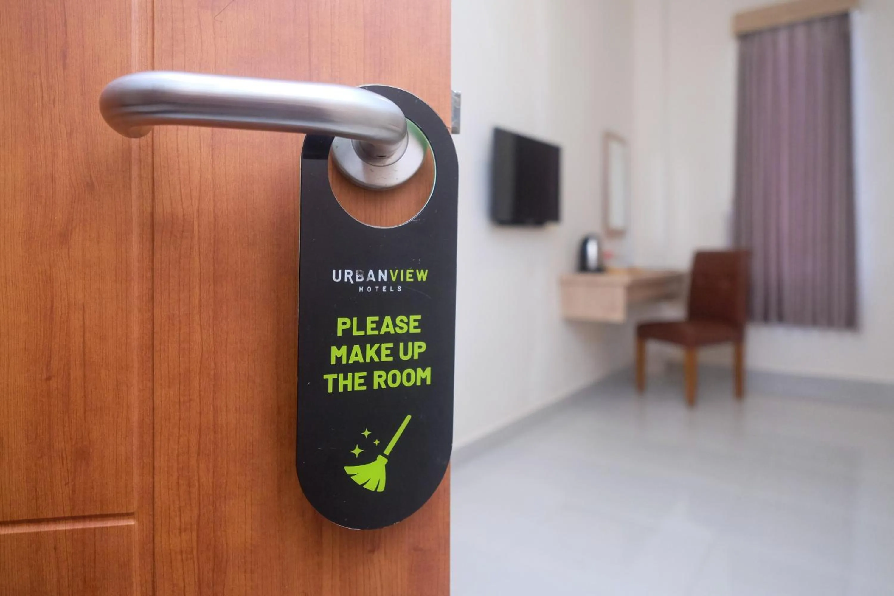 Bedroom in Urbanview Hotel DJ Inn Tegal