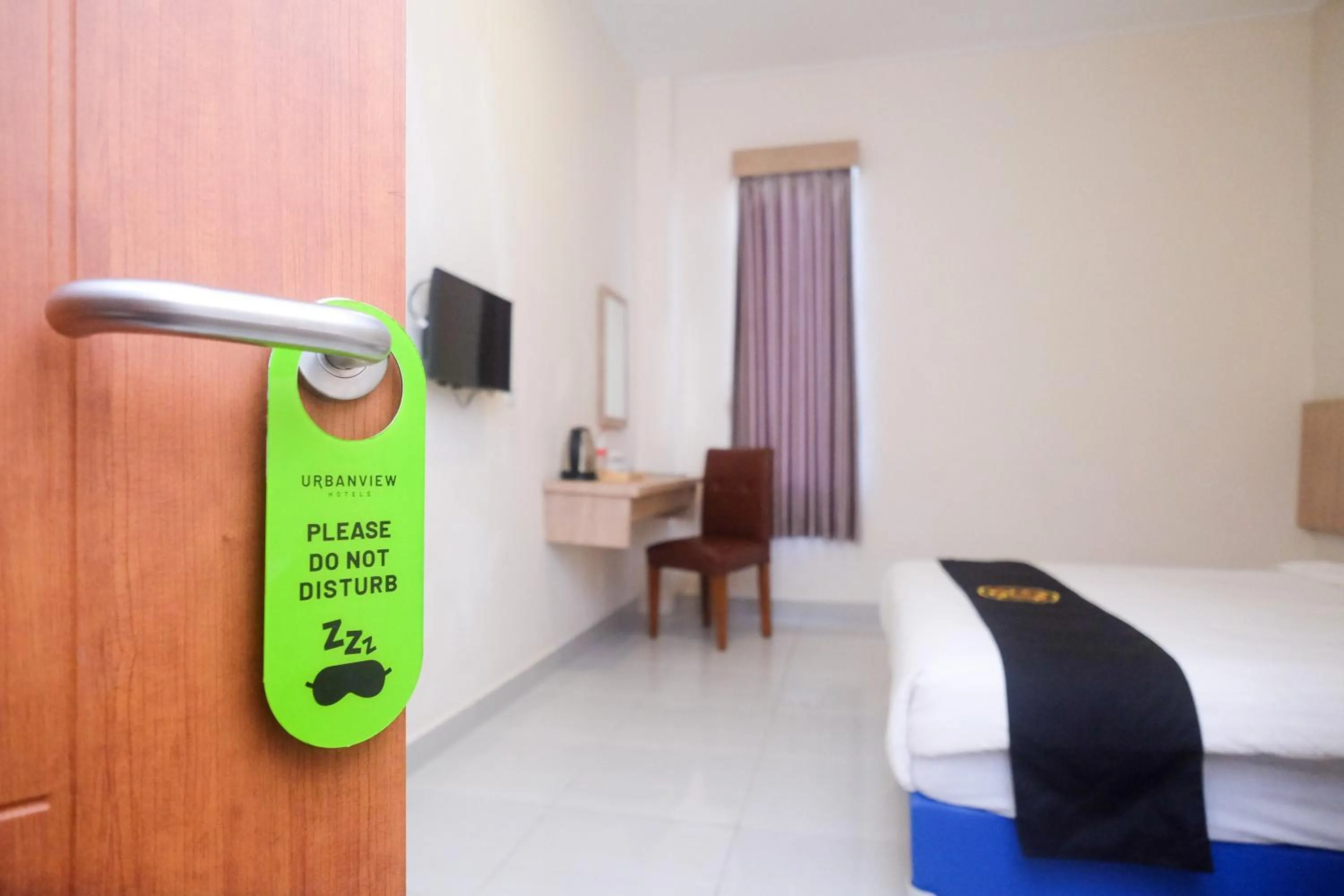 Bed in Urbanview Hotel DJ Inn Tegal