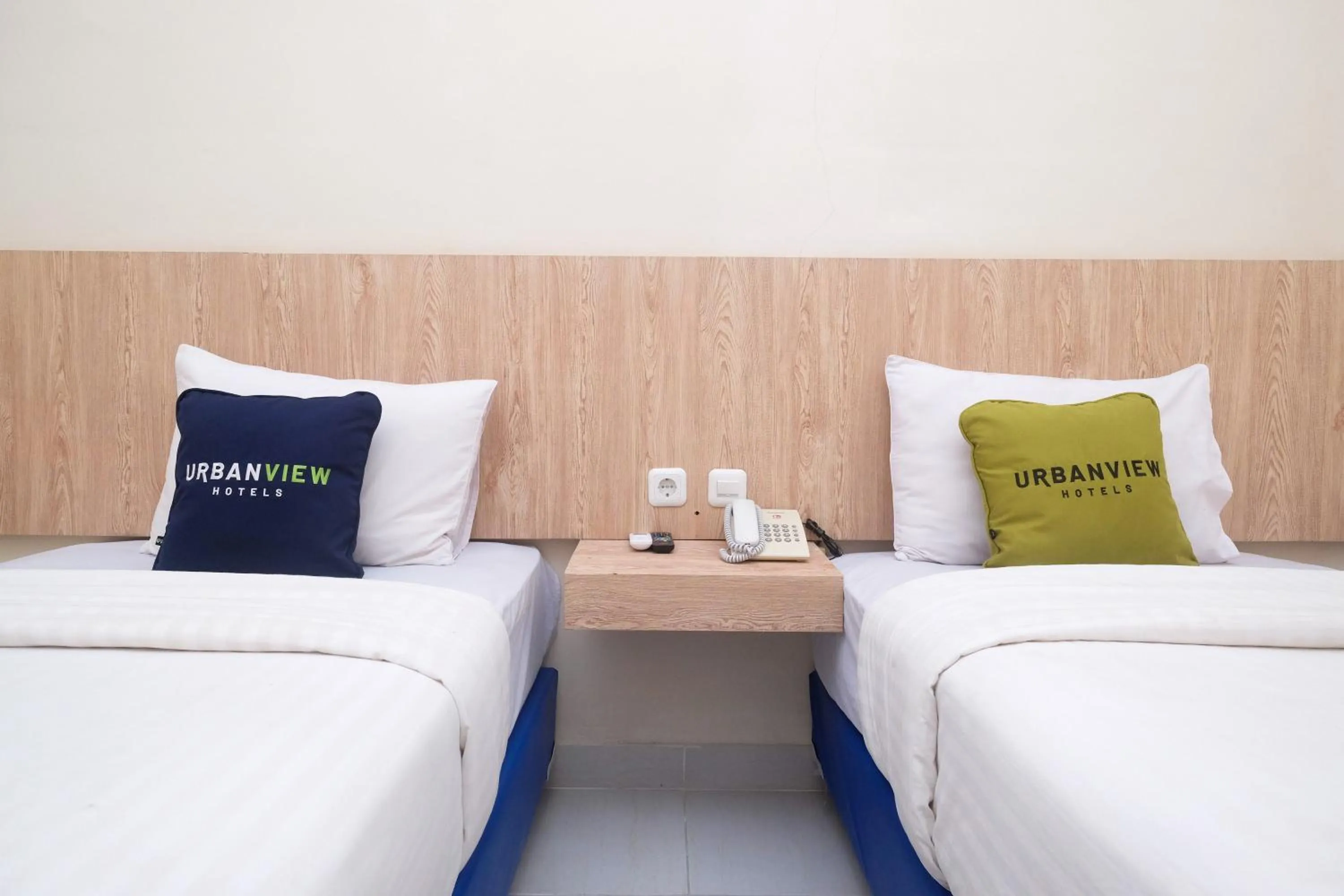 Bed in Urbanview Hotel DJ Inn Tegal