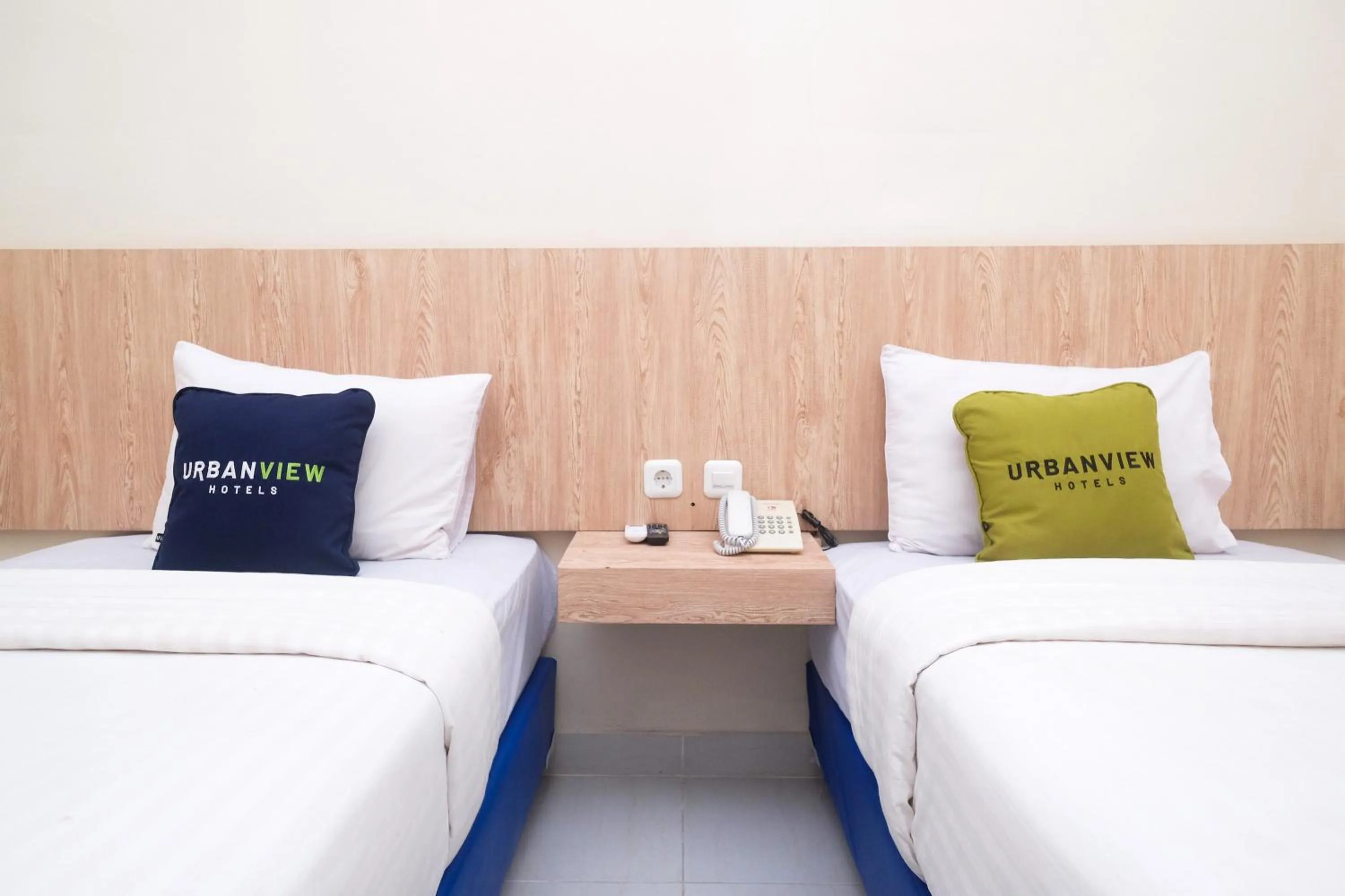 Bed in Urbanview Hotel DJ Inn Tegal