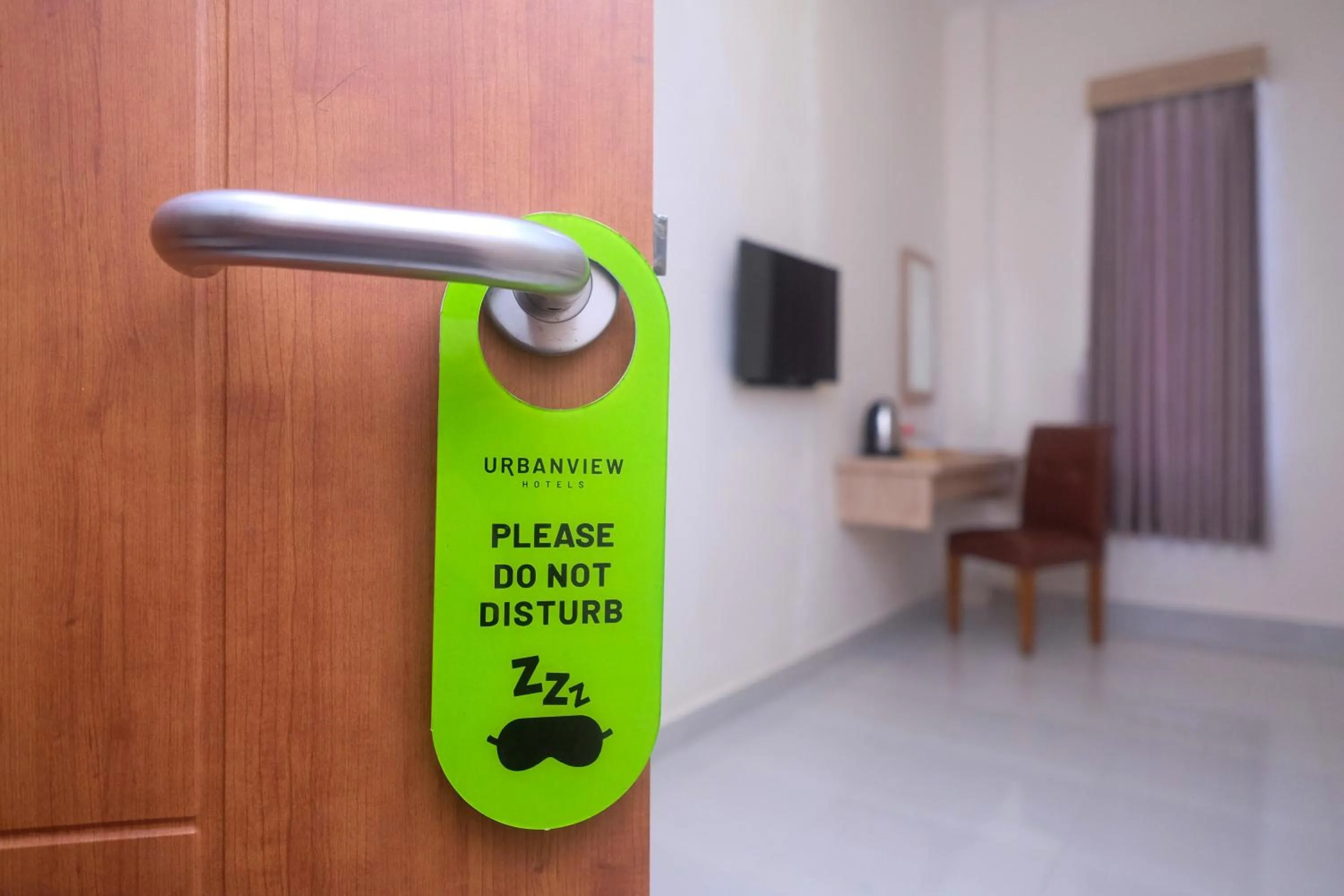 Bedroom in Urbanview Hotel DJ Inn Tegal