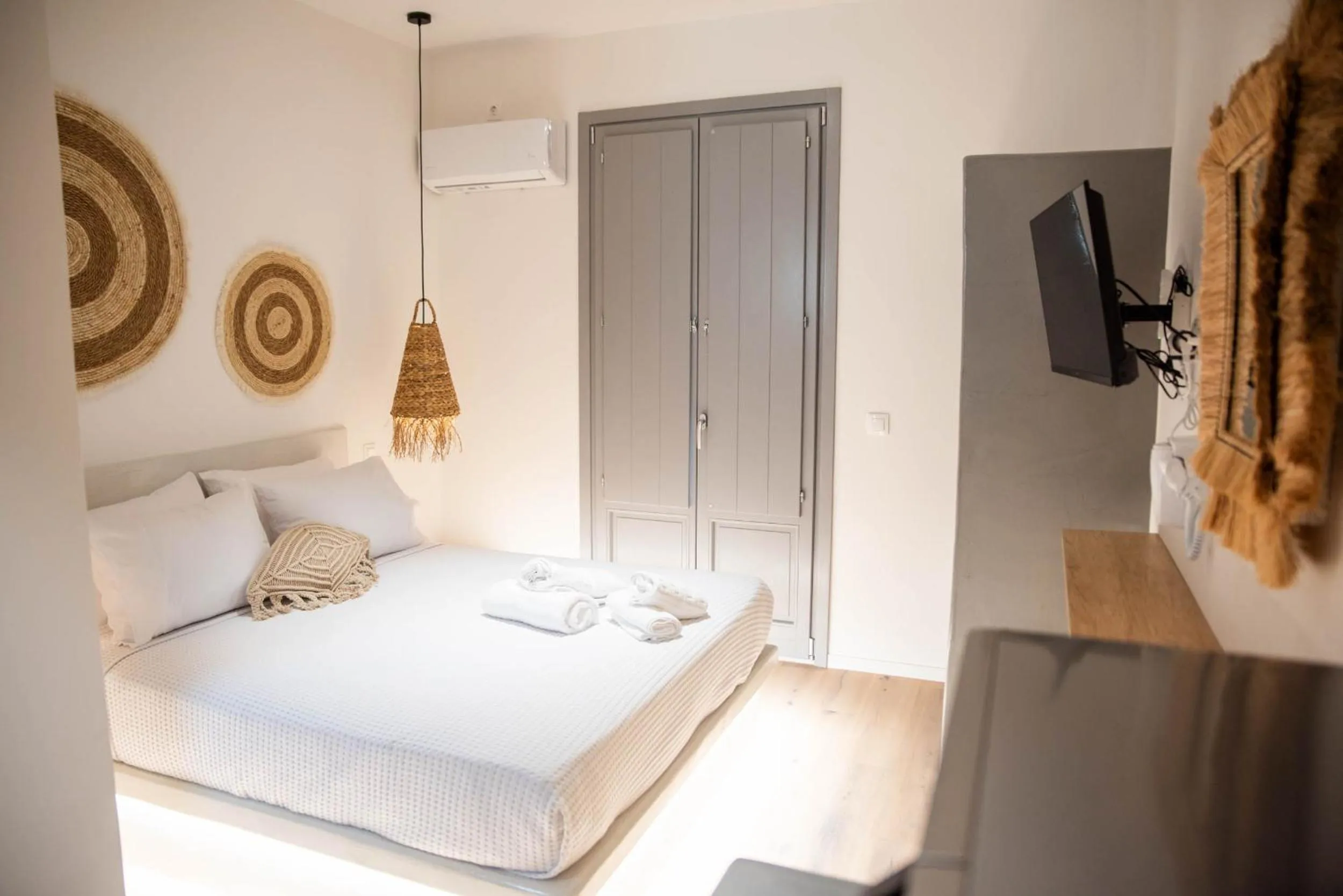 Bed in Aidani Luxurious Rooms