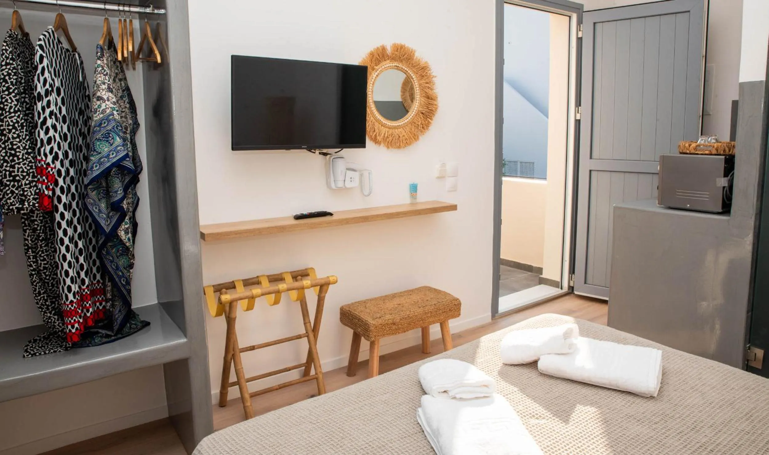 TV and multimedia, Bed in Aidani Luxurious Rooms