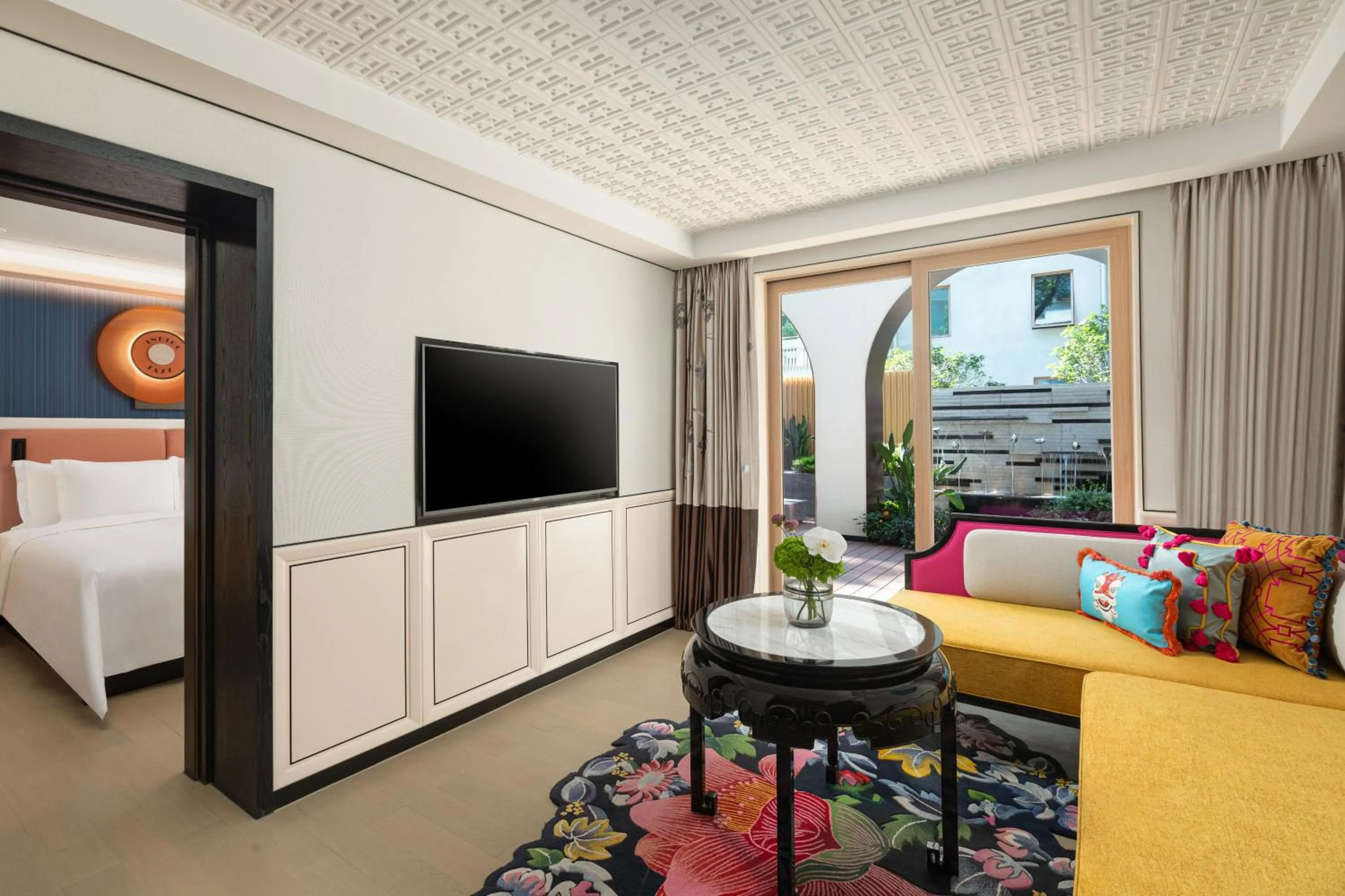 Living room, Bed in Hotel Indigo Guangzhou Haixinsha by IHG