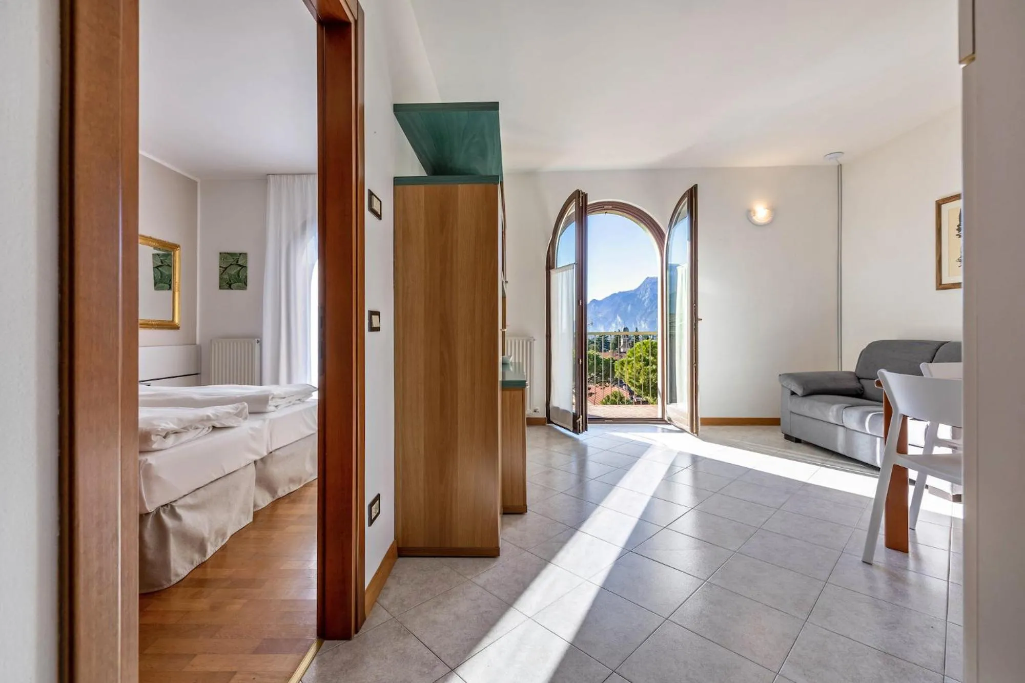Living room, Bed in Appartamenti Villa Belvedere