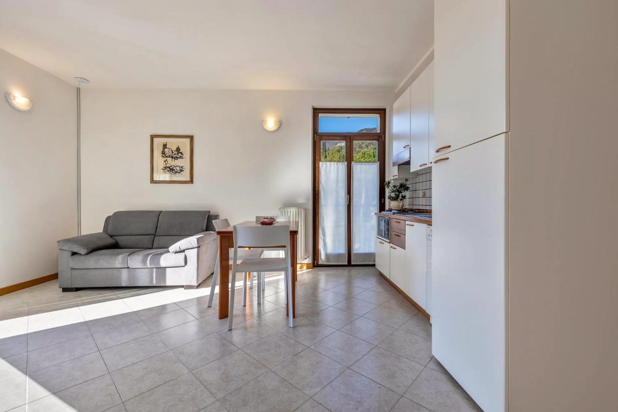 Living room, Bed in Appartamenti Villa Belvedere